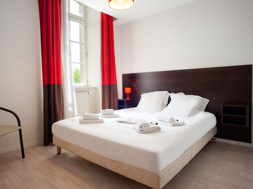 image Drift to sleep in a comfortable bed after a wonderful day outside.