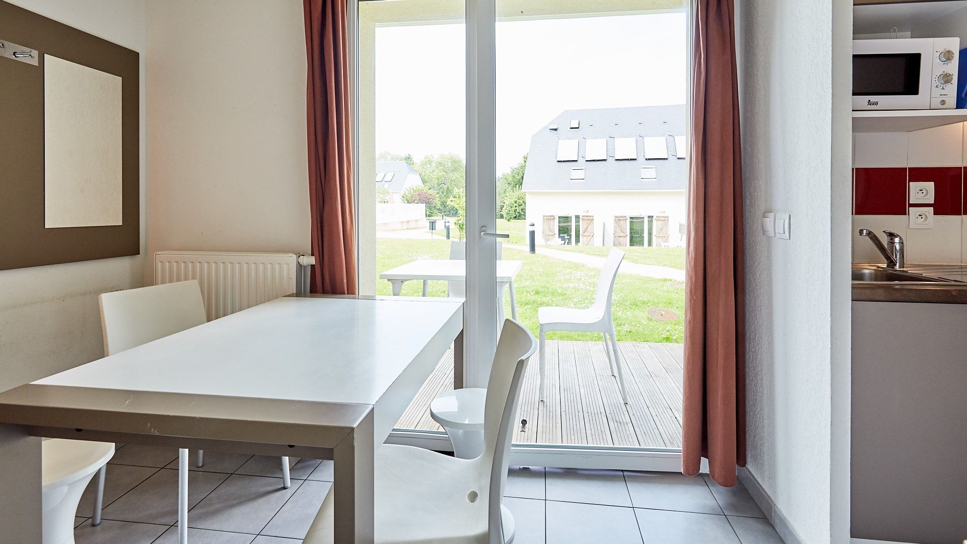 image Share meals and laughs at the dining table.