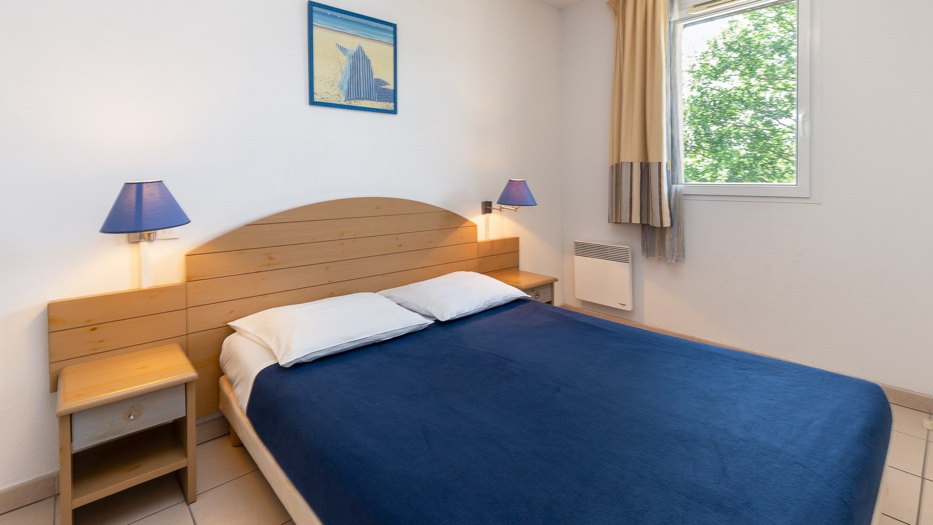image Drift to sleep in a comfortable bed after a wonderful day outside.
