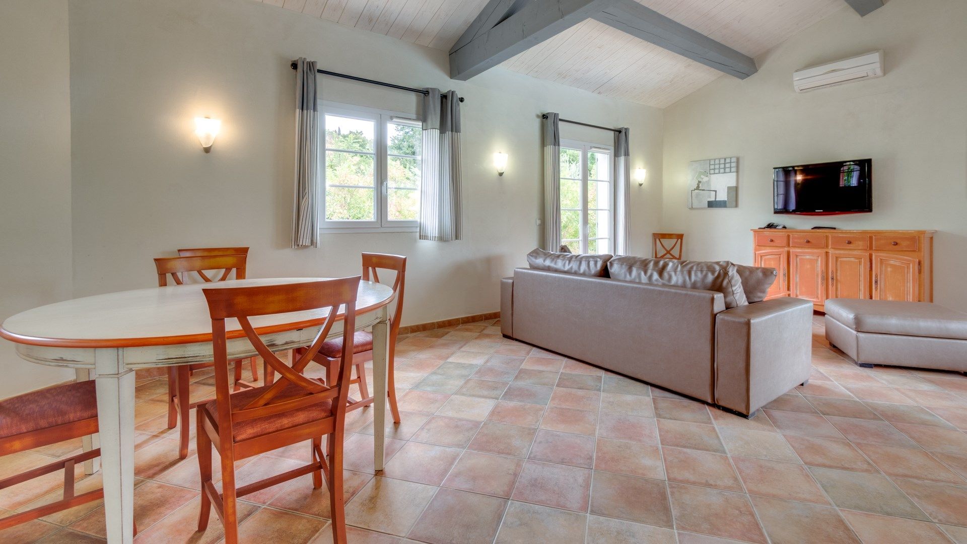 image Settle into the dining area and enjoy a nice meal.