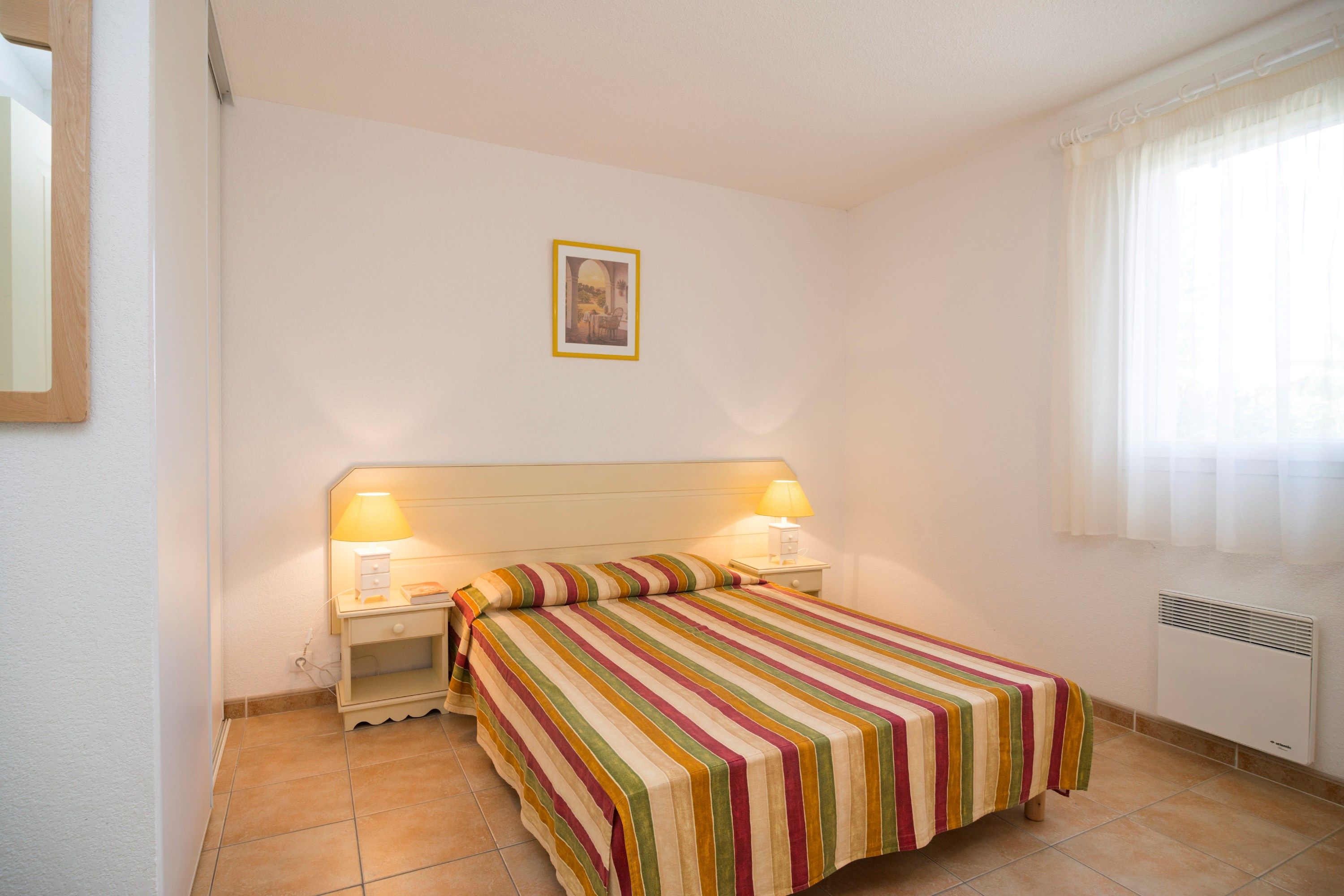 image There is a Double bed in the cozy studio.