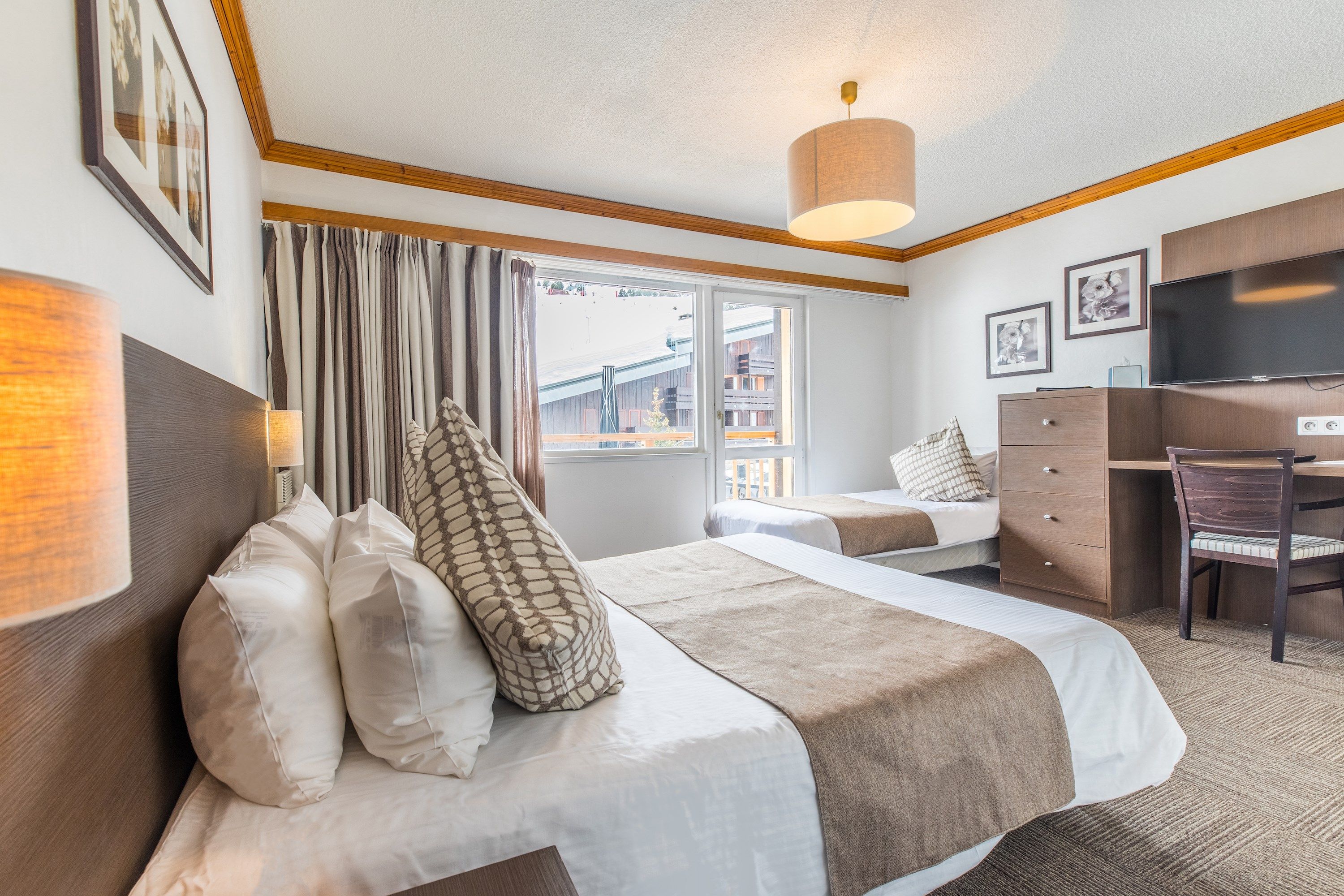 image Get a good night's rest in the cozy bedroom, which has 3 Single beds (2 of which can be put together to form a Double bed).