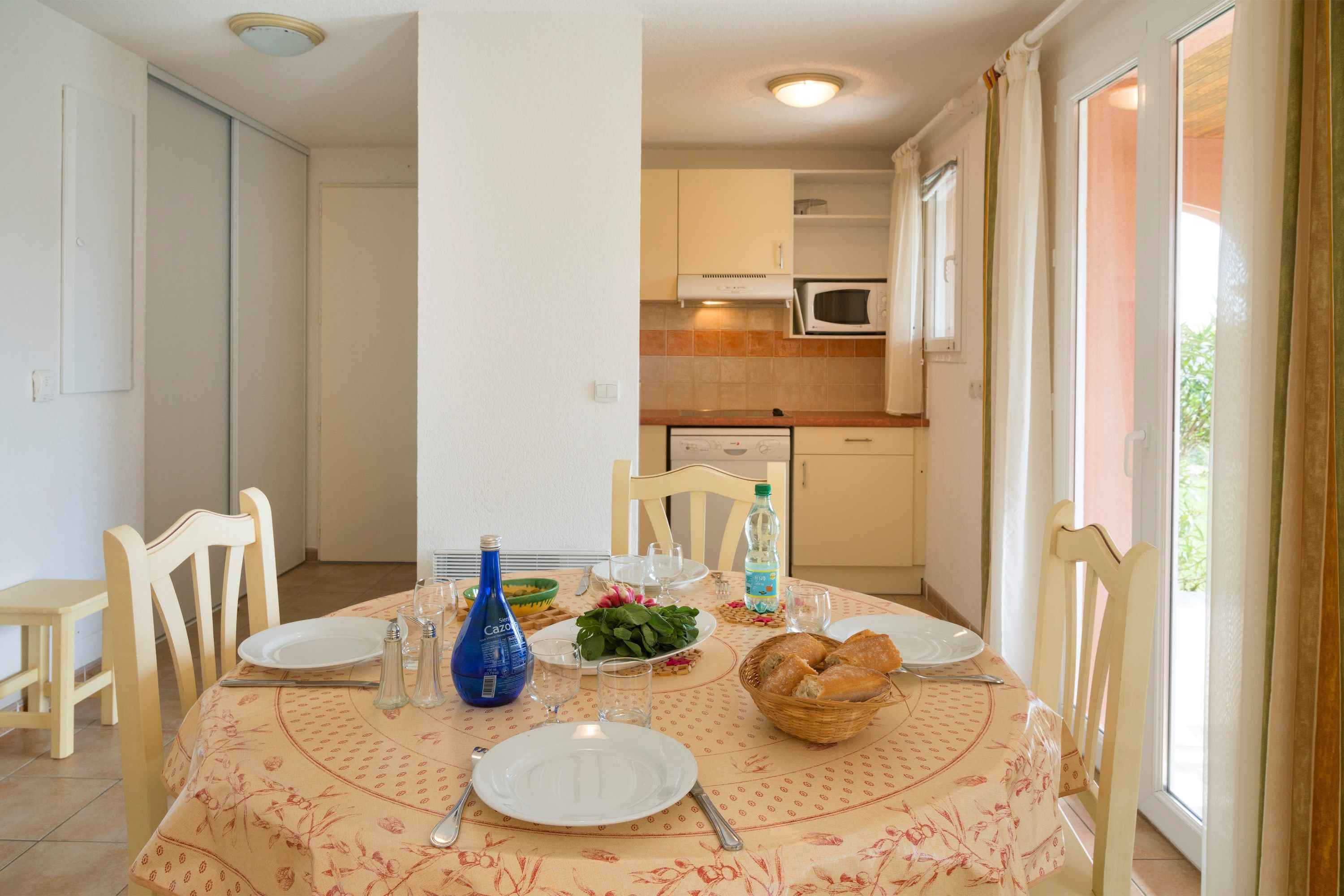 image Reconnect with loved ones over a meal at the dining table.