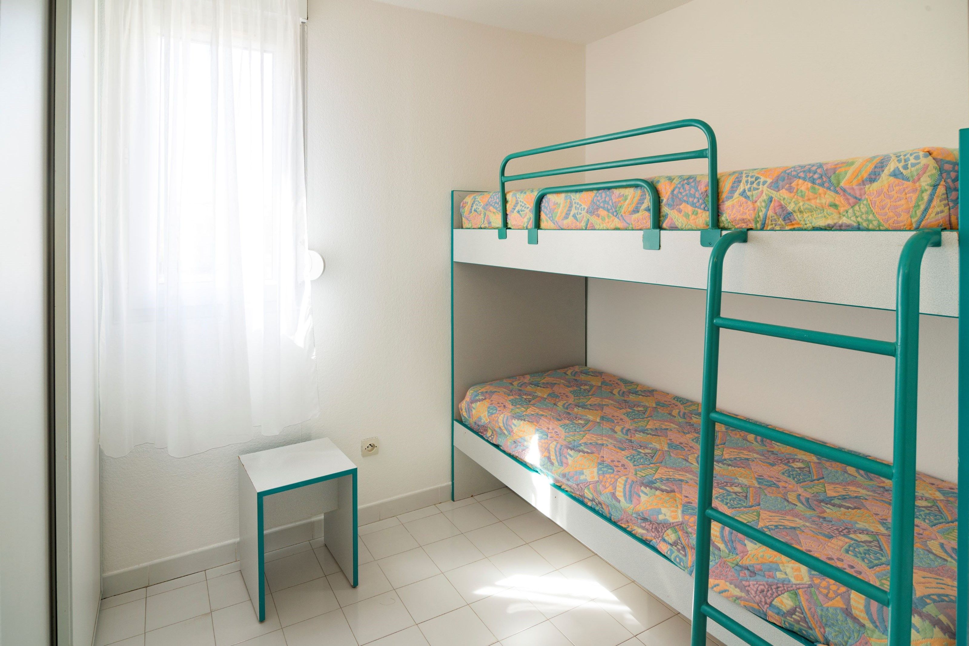 image The third bedroom features a Bunk bed.
