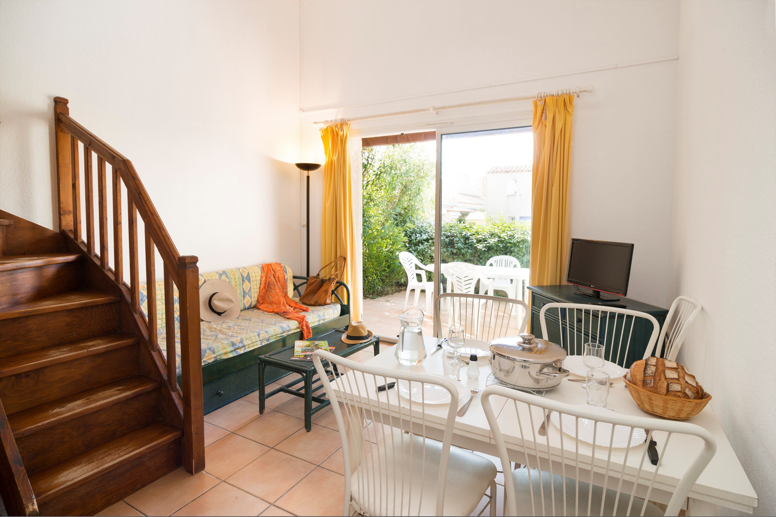 image Sit back and relax in our cozy and charming house! Please note that photos are representative.