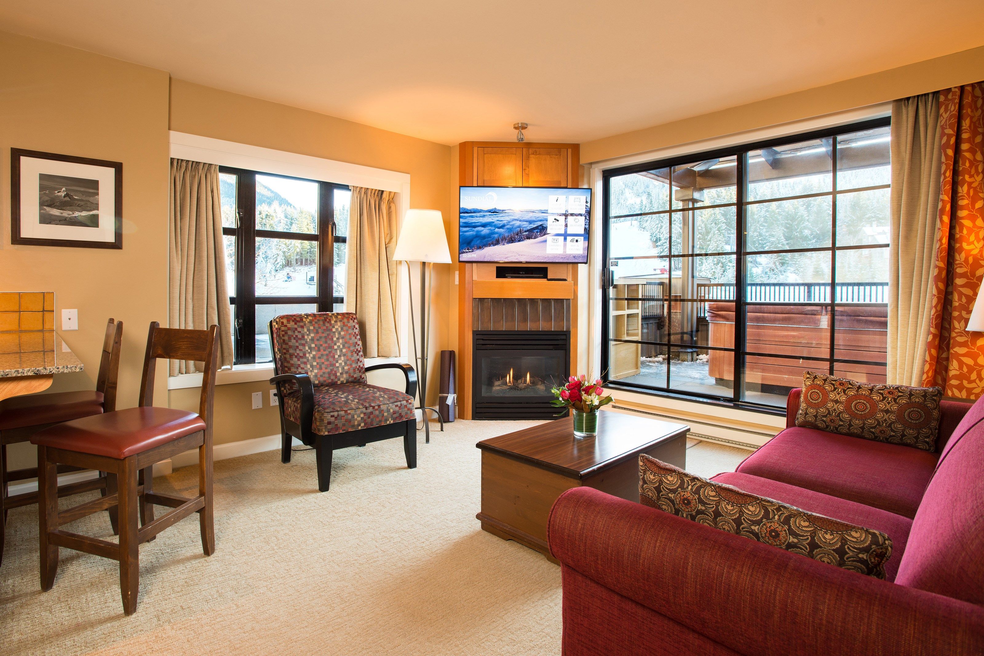 image Warm up in front of the fireplace in your condo.