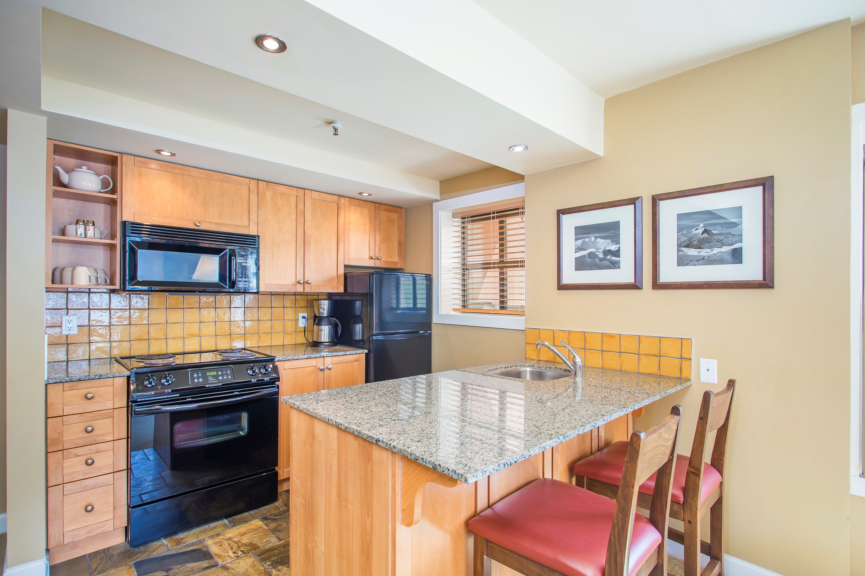 image The gourmet kitchen comes fully-equipped for you to cook up a storm.