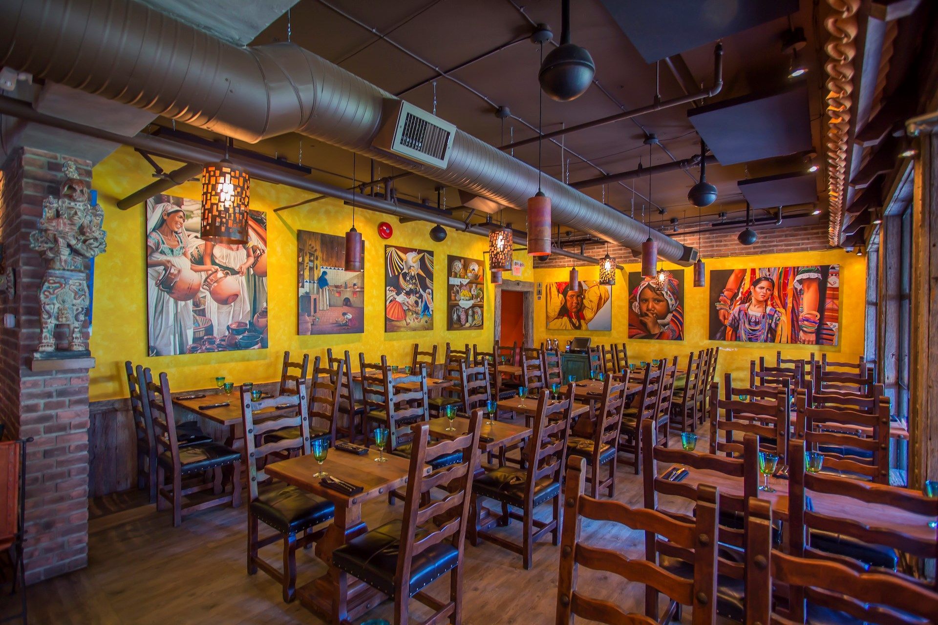 image A charming and lively shared dining space with a rustic vibe, ideal for enjoying a meal or socializing.