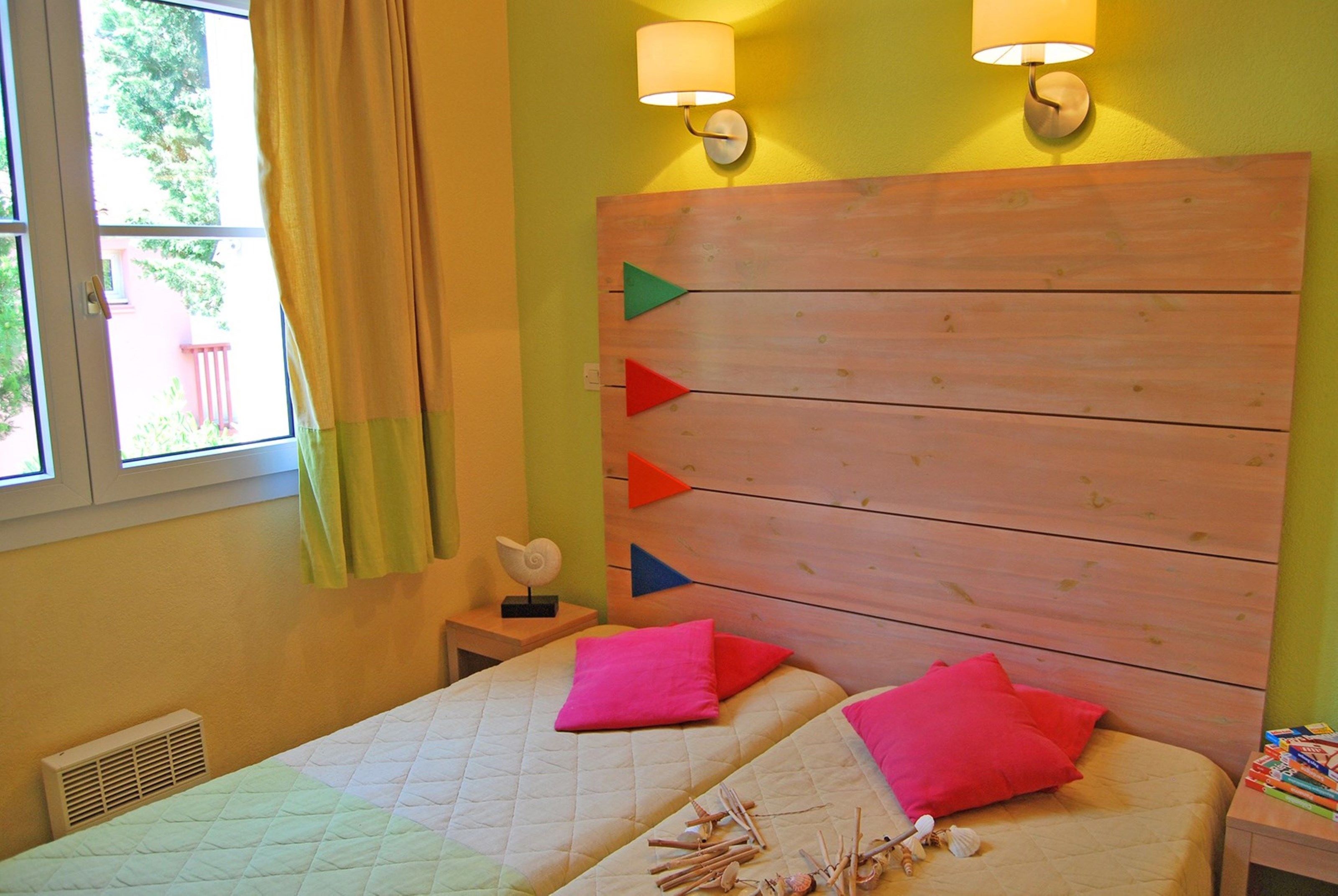 image Get a peaceful night sleep in our cozy bedroom with 2 Single beds or a Bunk bed.