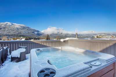 Soak in your private hot tub on the balcony!