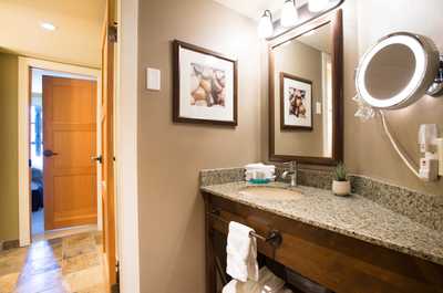 An additional Half bath provides ample space for everyone to get ready.