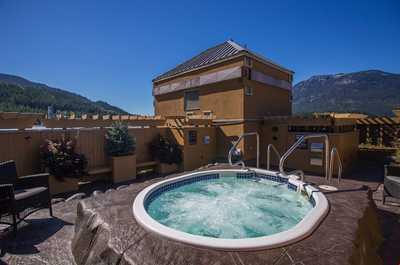 Enjoy a serene escape in the rooftop hot tub, surrounded by stunning mountain views and fresh alpine air.