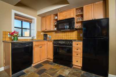 Craft a gourmet meal in the fully-equipped kitchen.