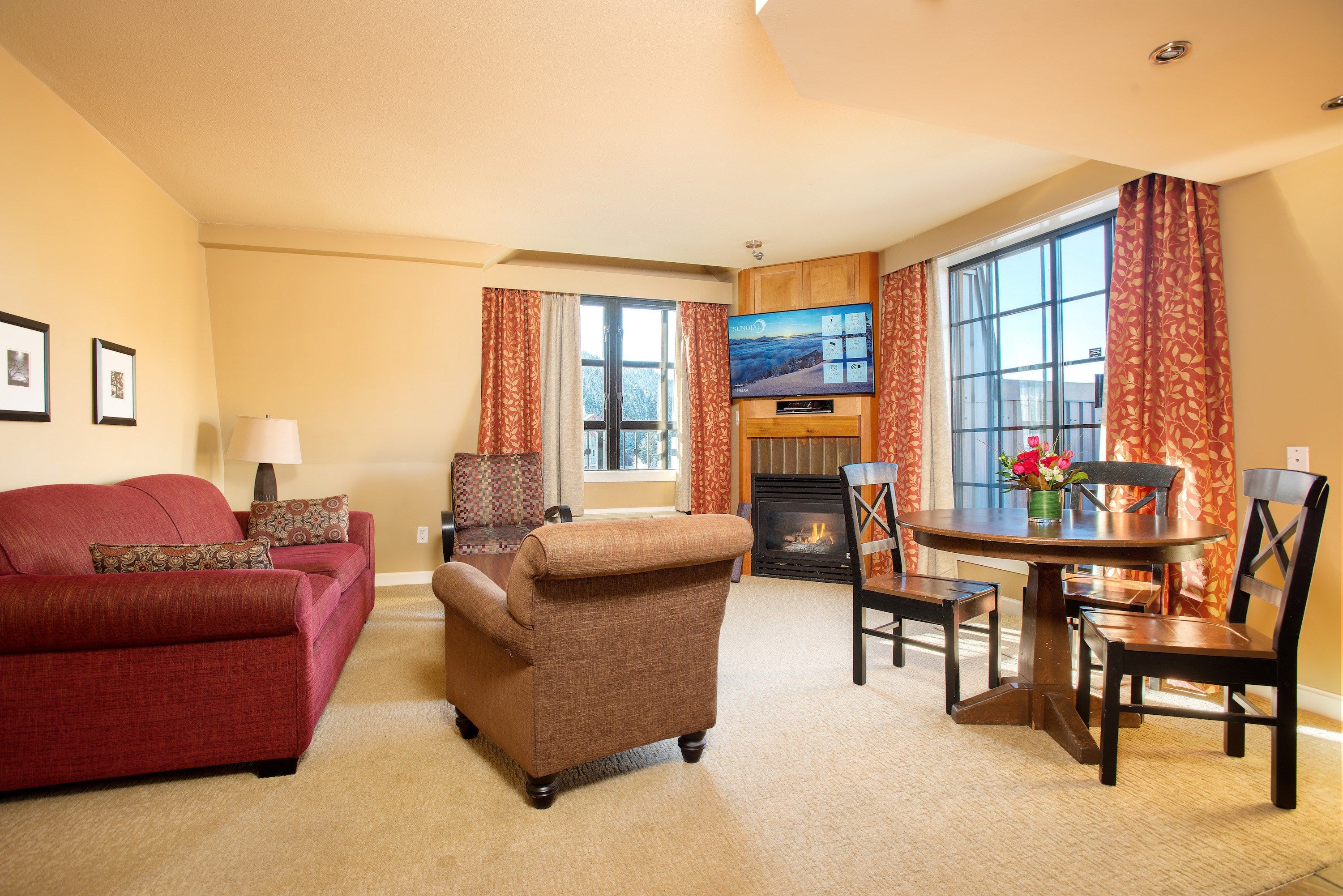 image Relax in front of the fireplace in our cozy and deluxe Whistler condo.