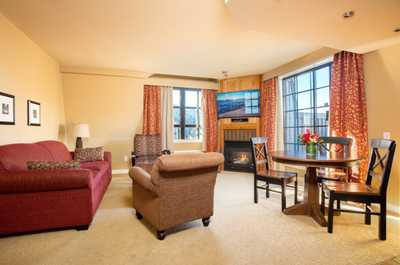 Relax in front of the fireplace in our cozy and deluxe Whistler condo.