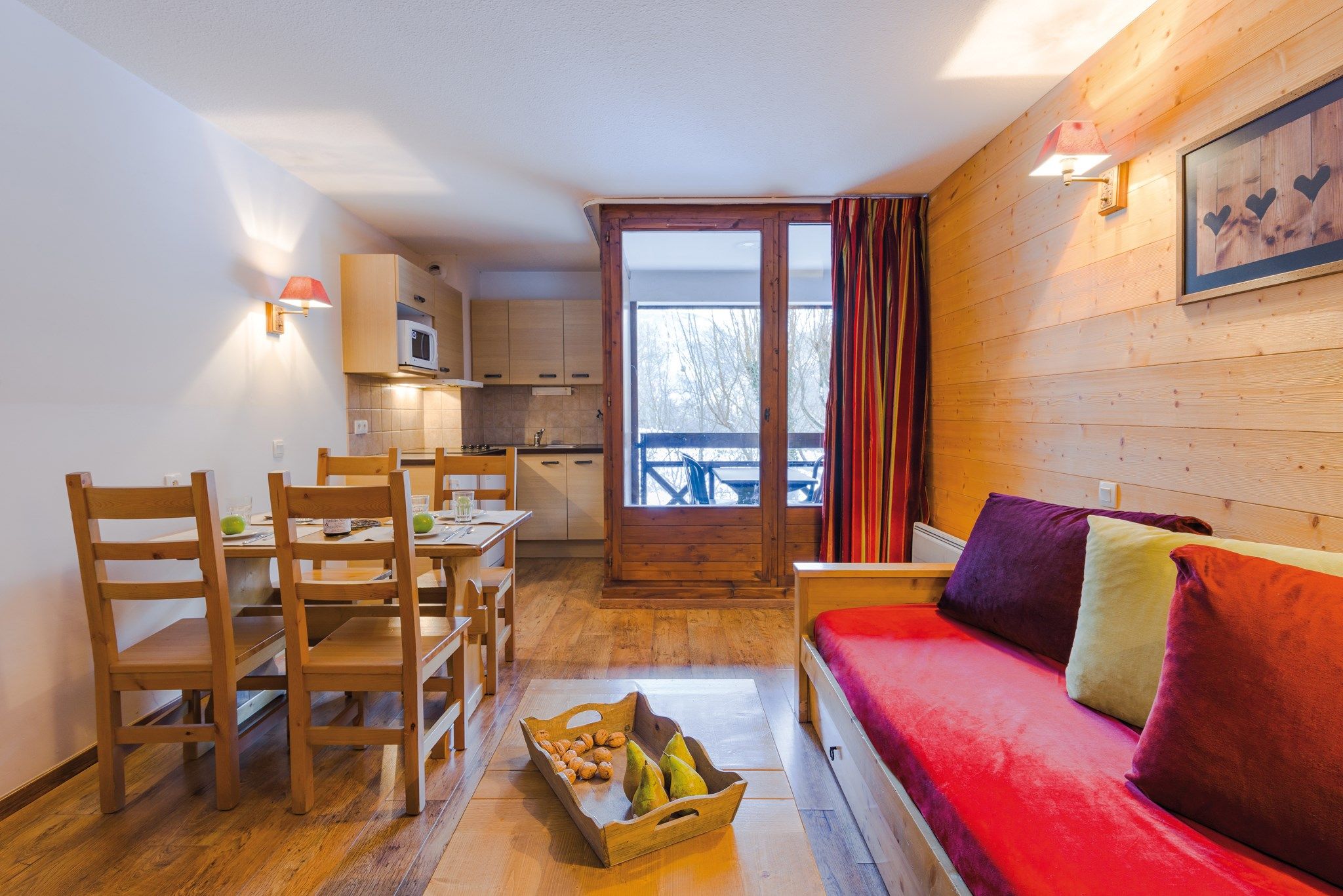 image Prepare meals in the kitchenette and enjoy them at the dining table.