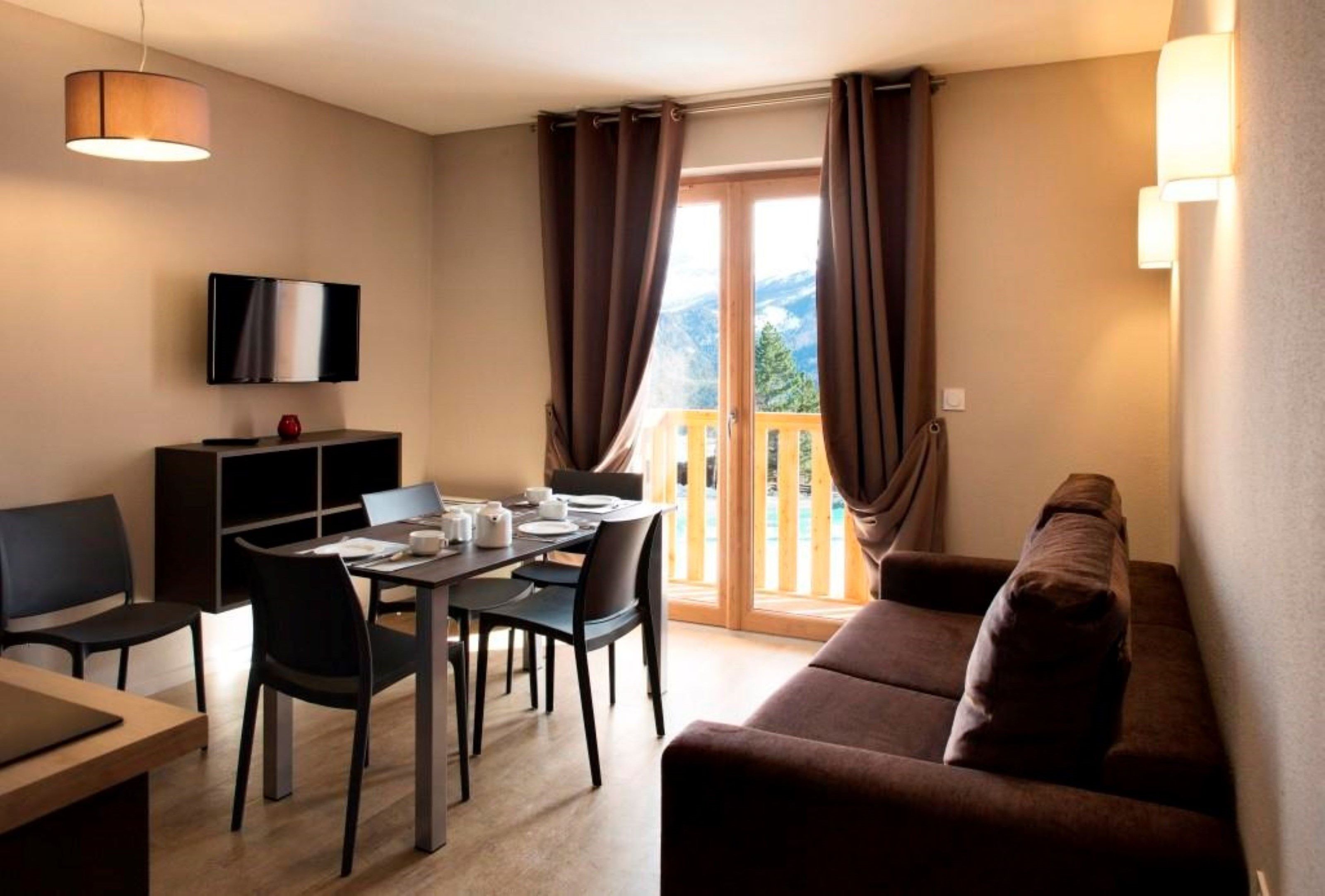 image Kick back your feet and relax in the cozy living area.