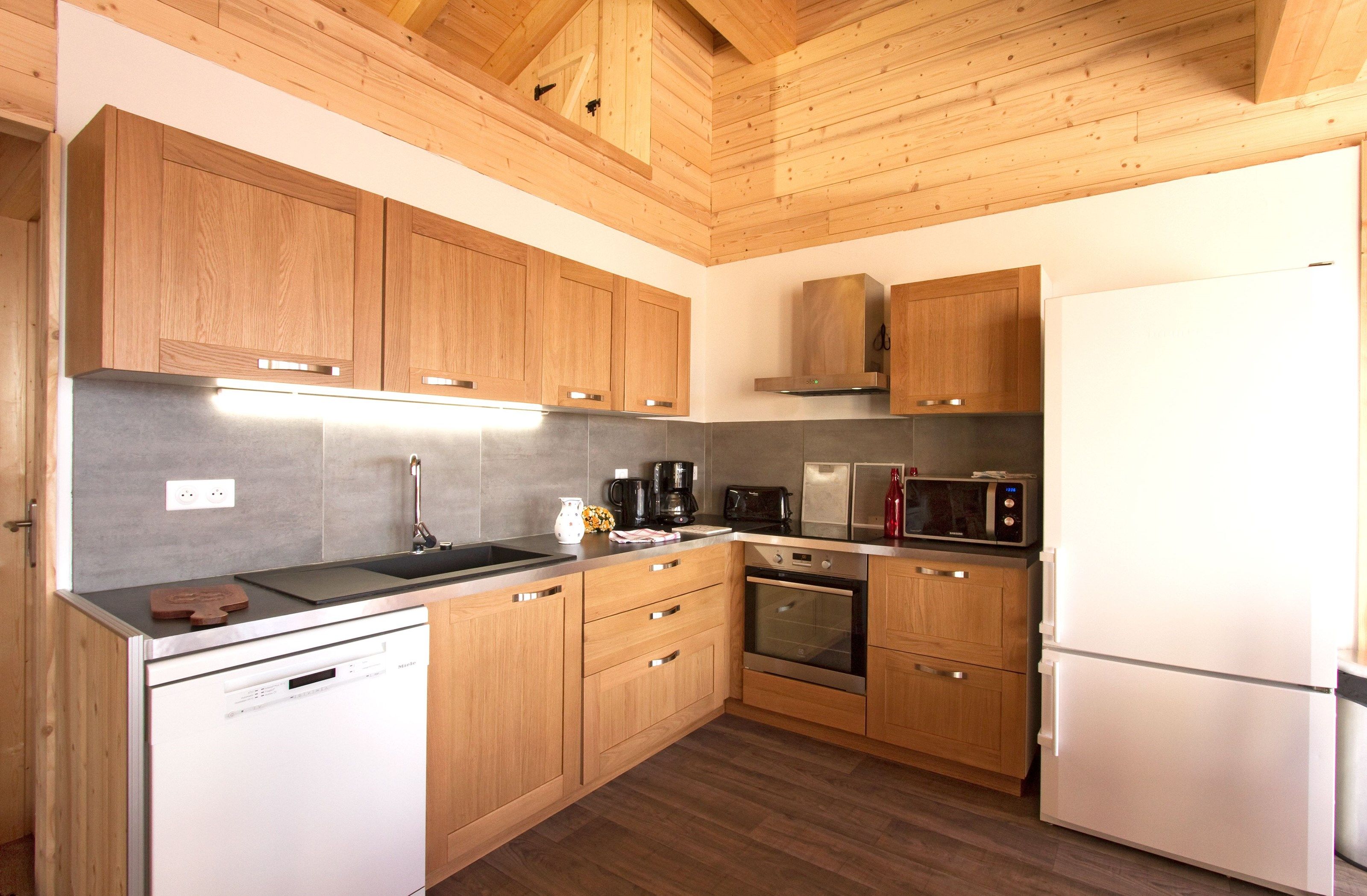 image The fully-equipped kitchen features all the amenities you'd need to make a delicious meal.