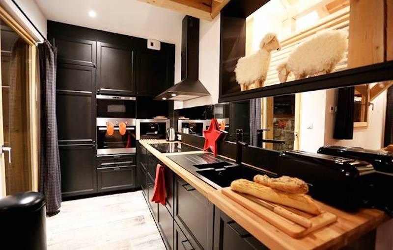 image The fully-equipped kitchen features all the amenities you'd need to make a delicious meal.