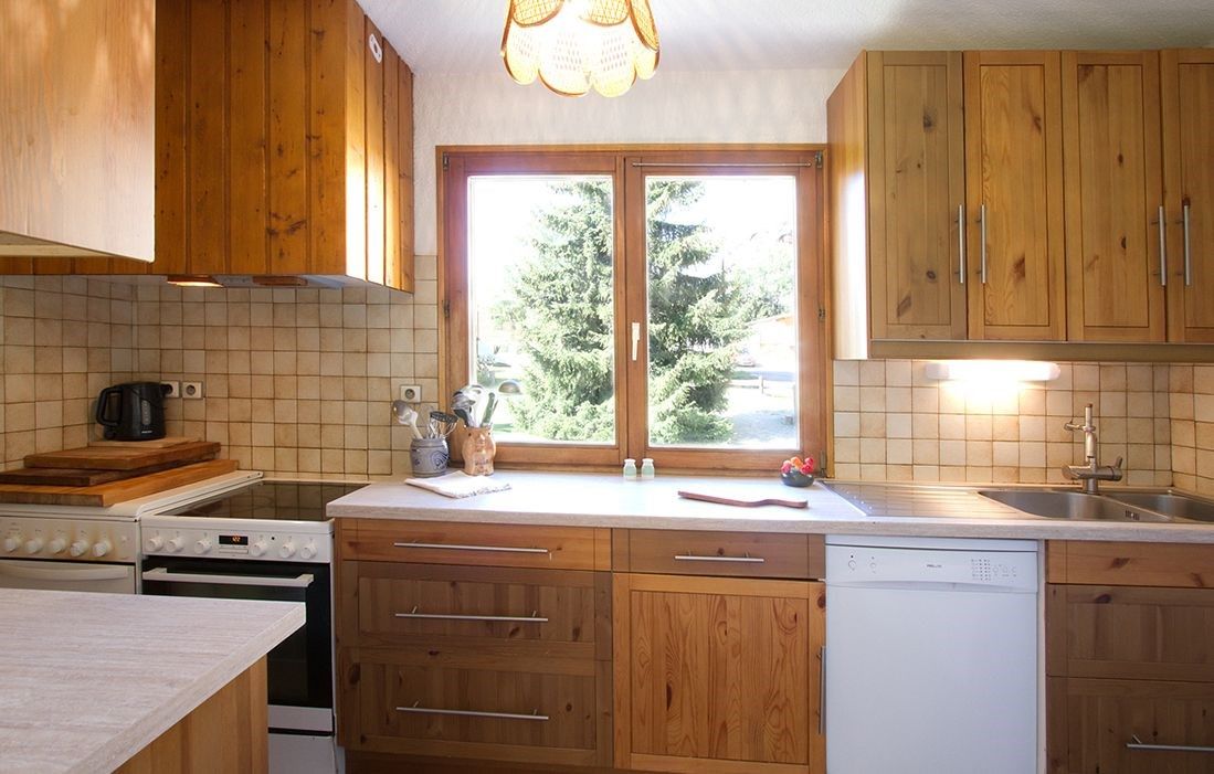 image Cook a meal in the kitchen.