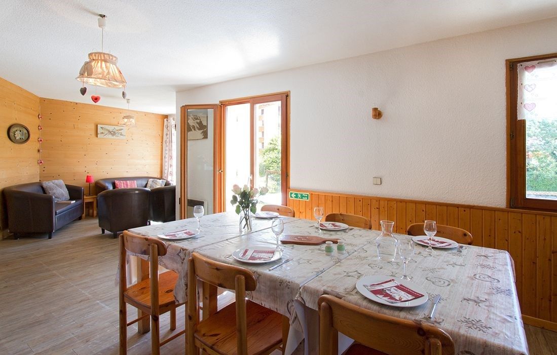 image Settle into the dining area and enjoy a nice meal.