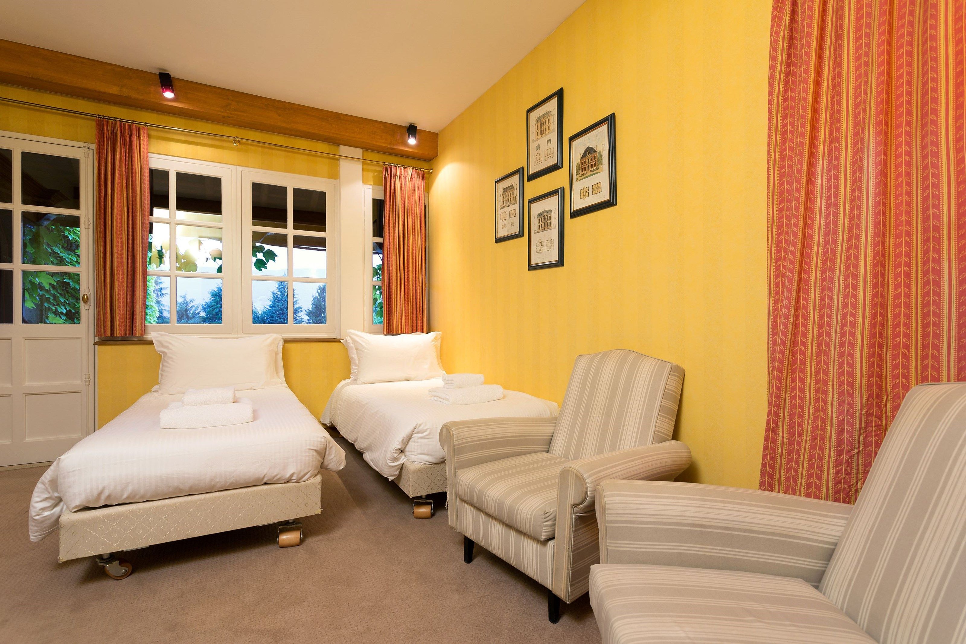 image The second bedroom features 2 Single beds.