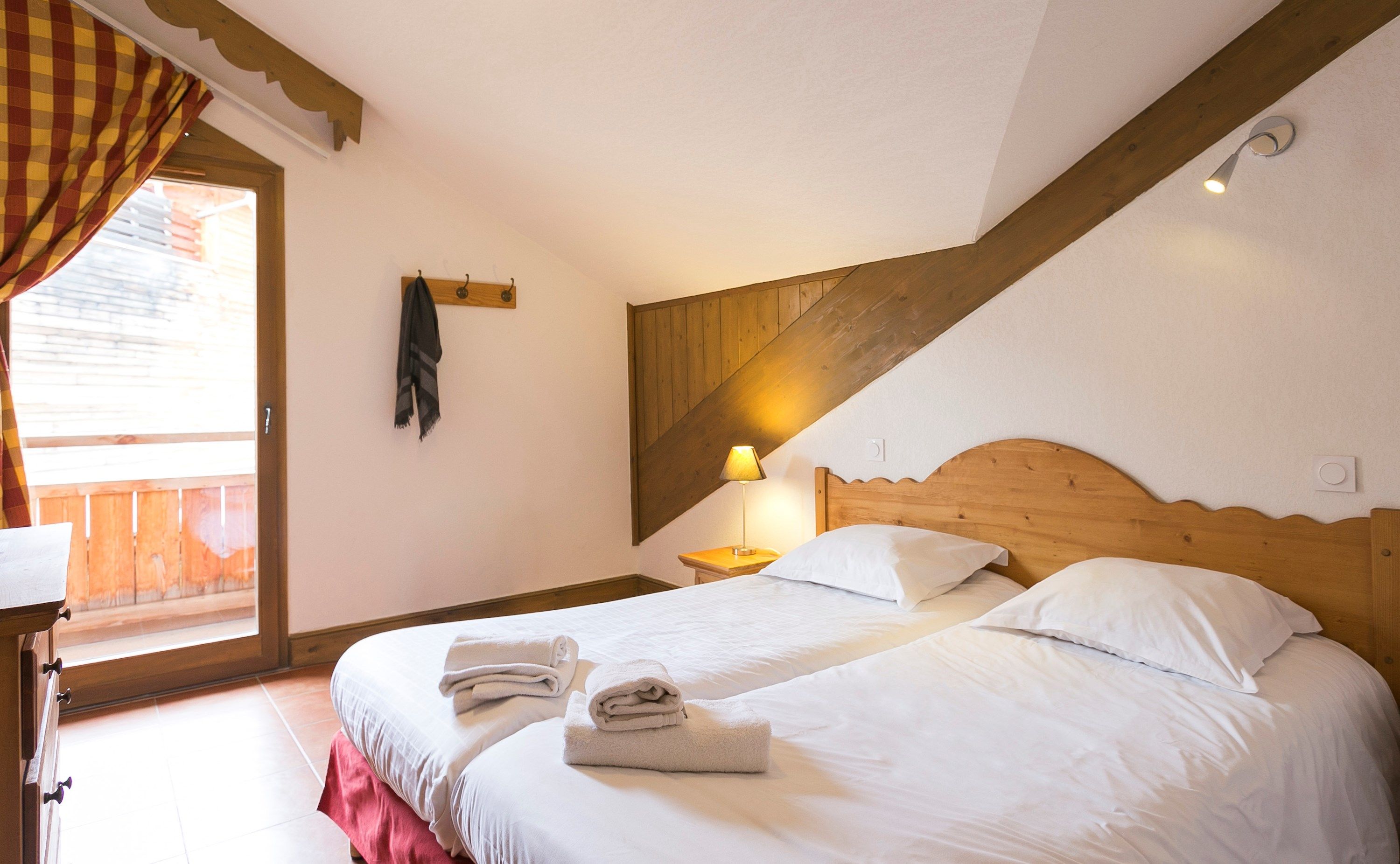 image Relax on the comfy Single beds after a day outside.