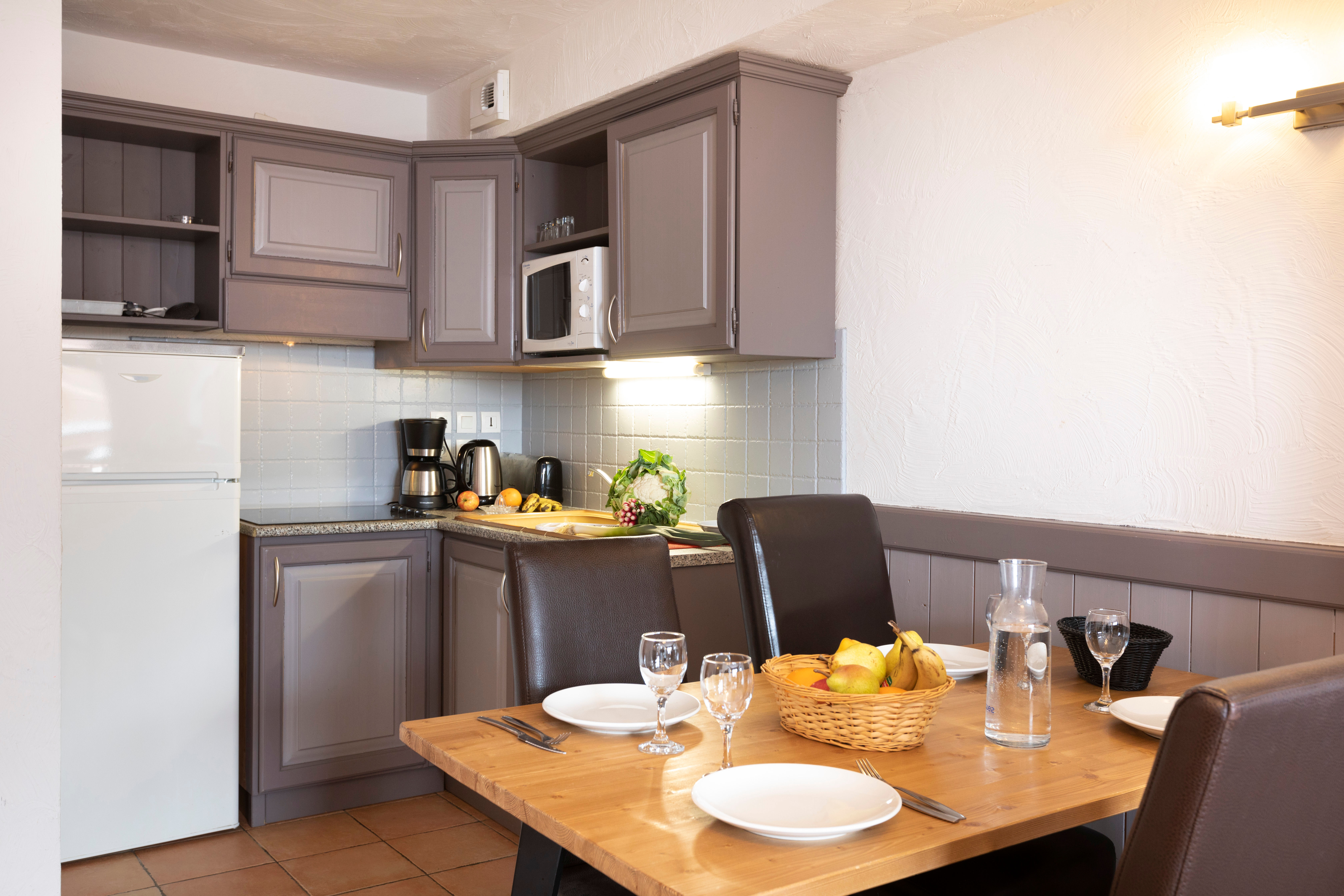 image Cook up a hearty meal in the fully equipped kitchen.