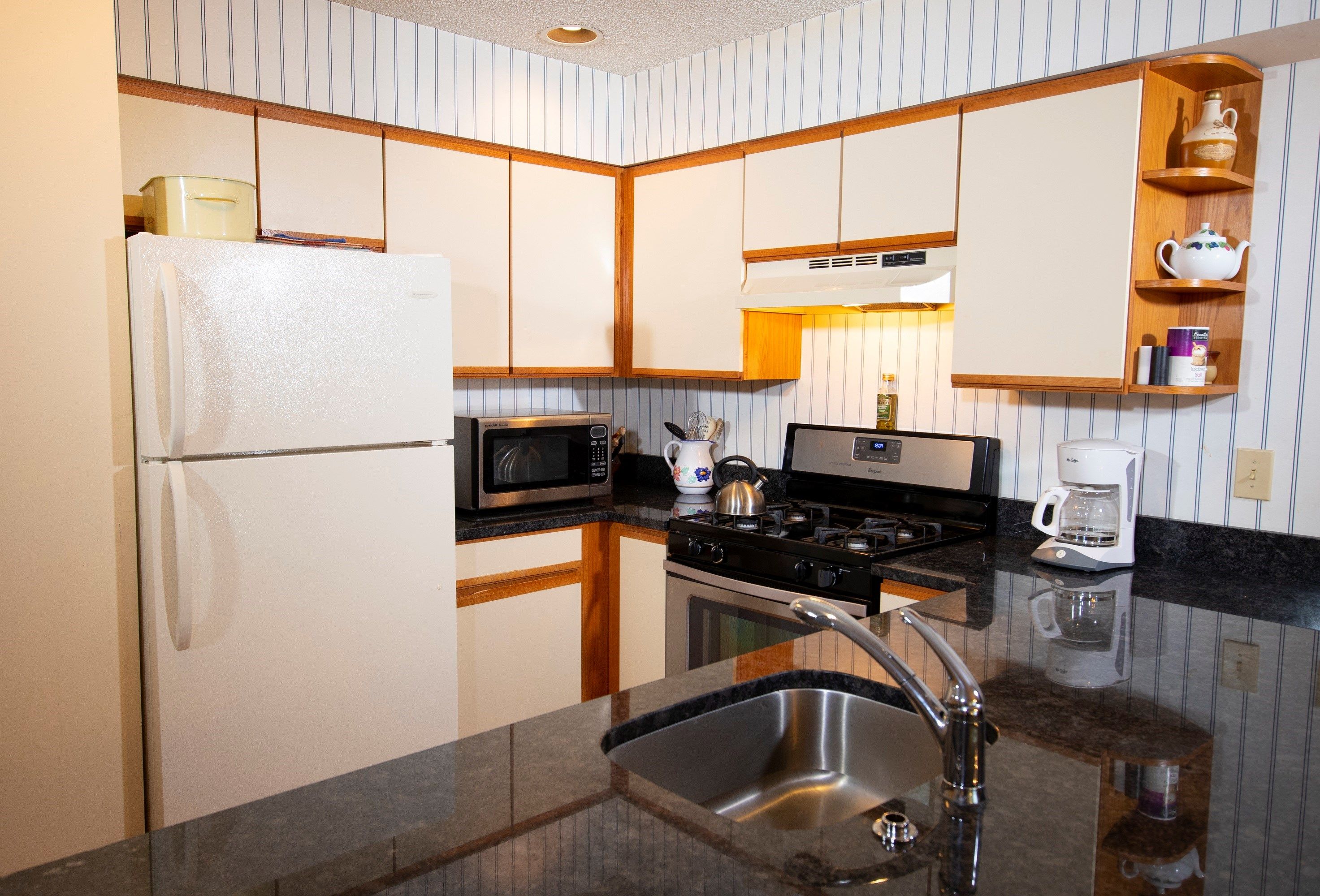 image Prepare a meal in the equipped kitchen.