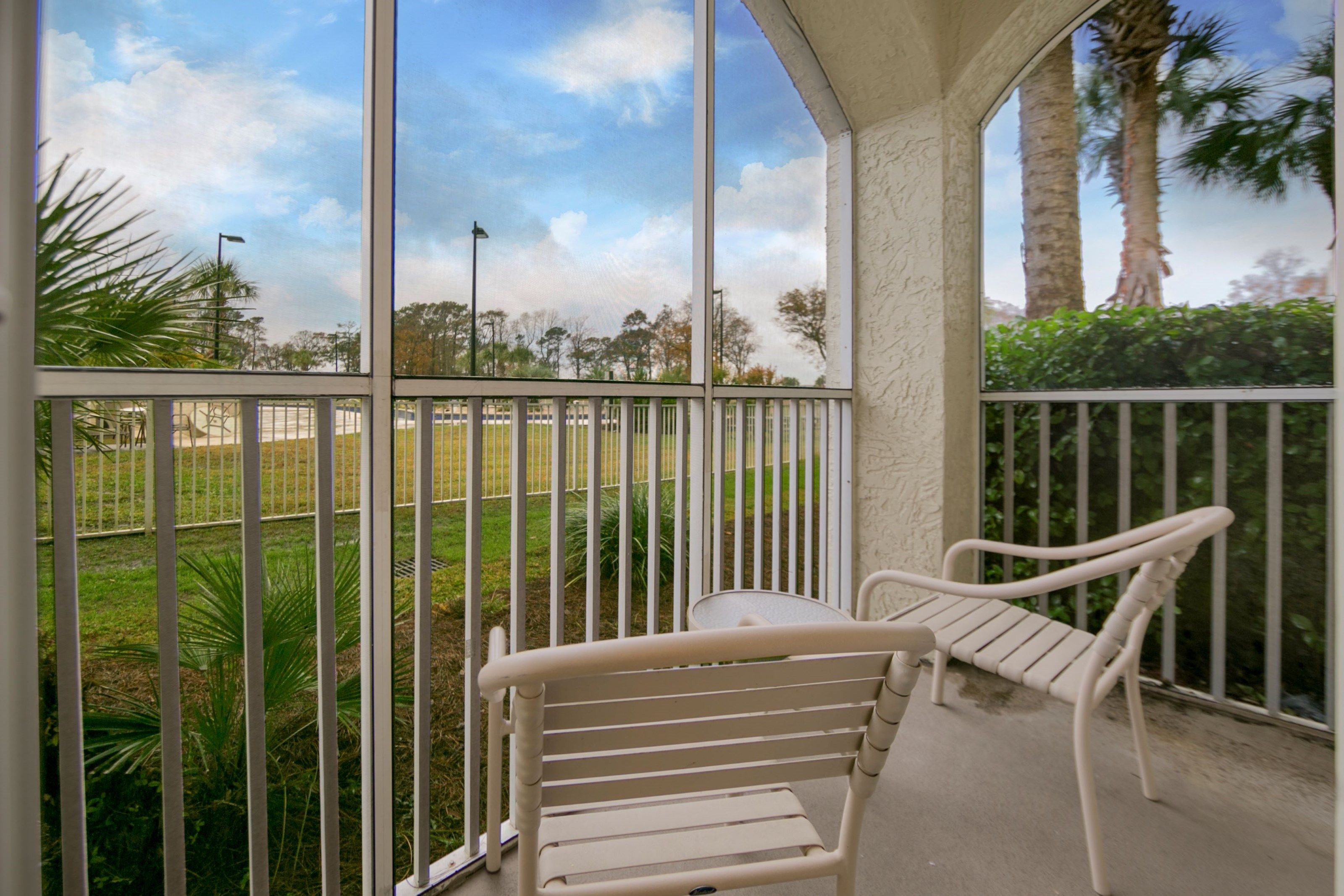image Enjoy reminiscing about your day while sipping a glass of wine outside on the patio.