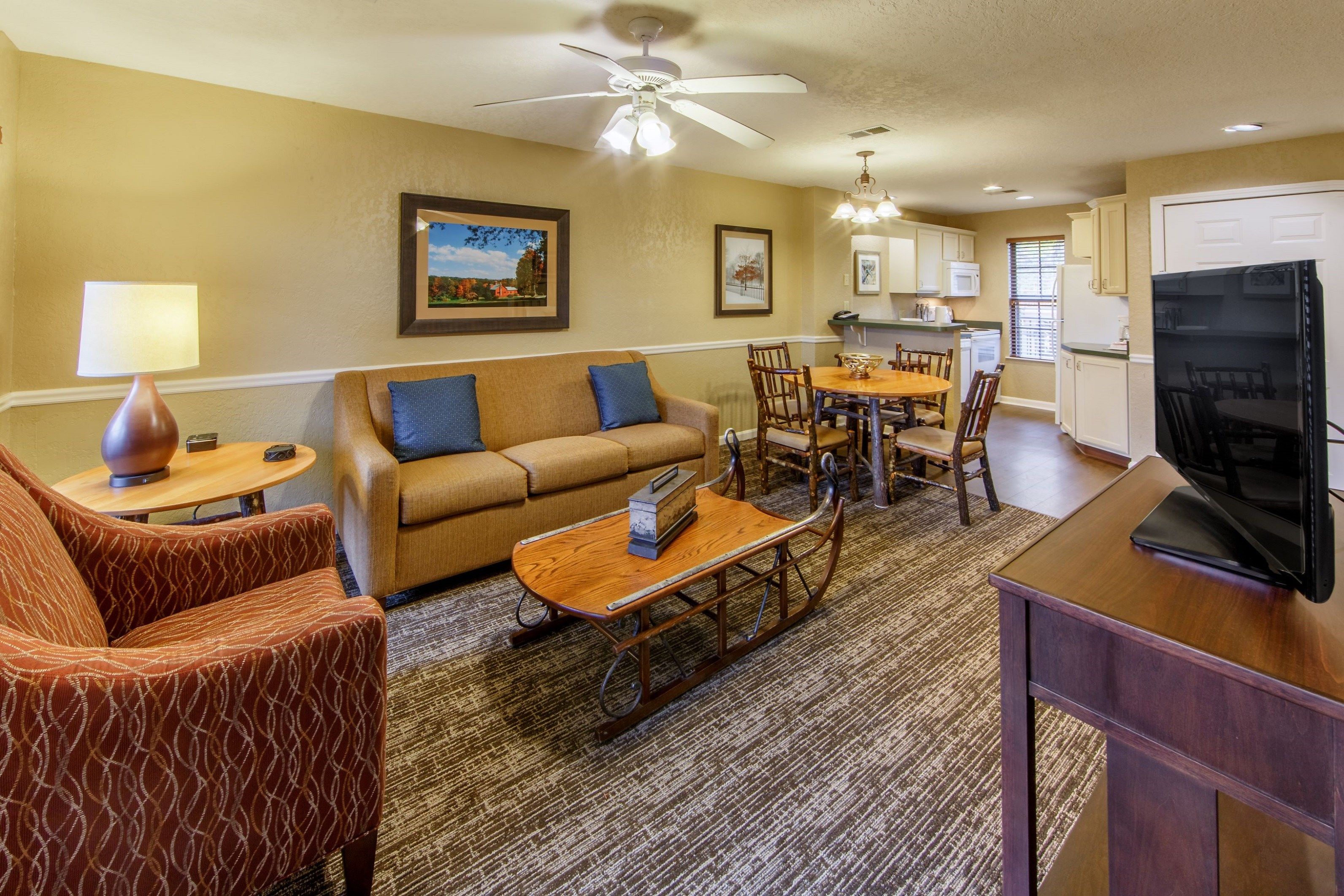 image Find peace and relaxation with your close friends and family in this stunning living room.