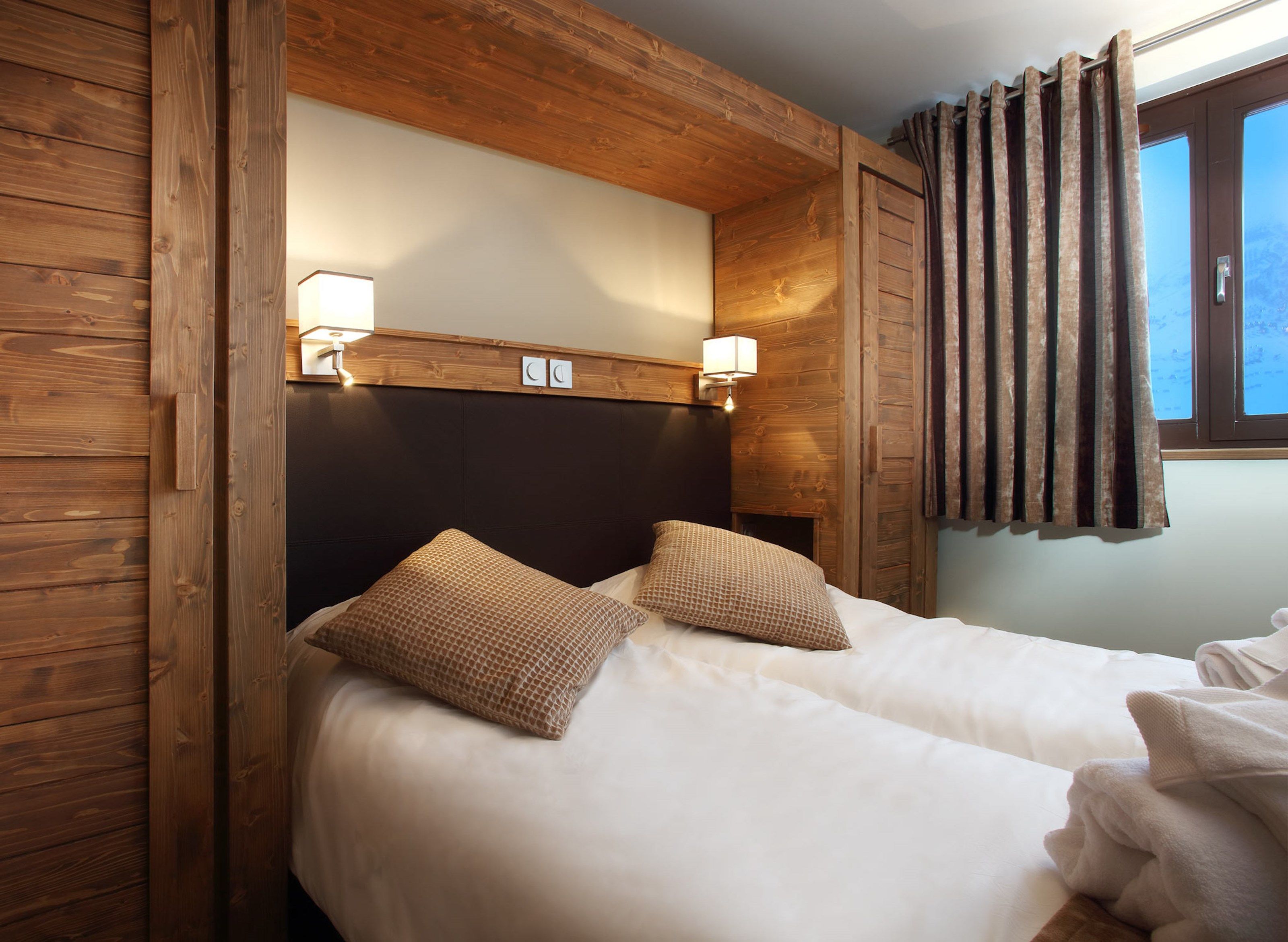 image The second and third bedrooms each feature 2 Single beds.
