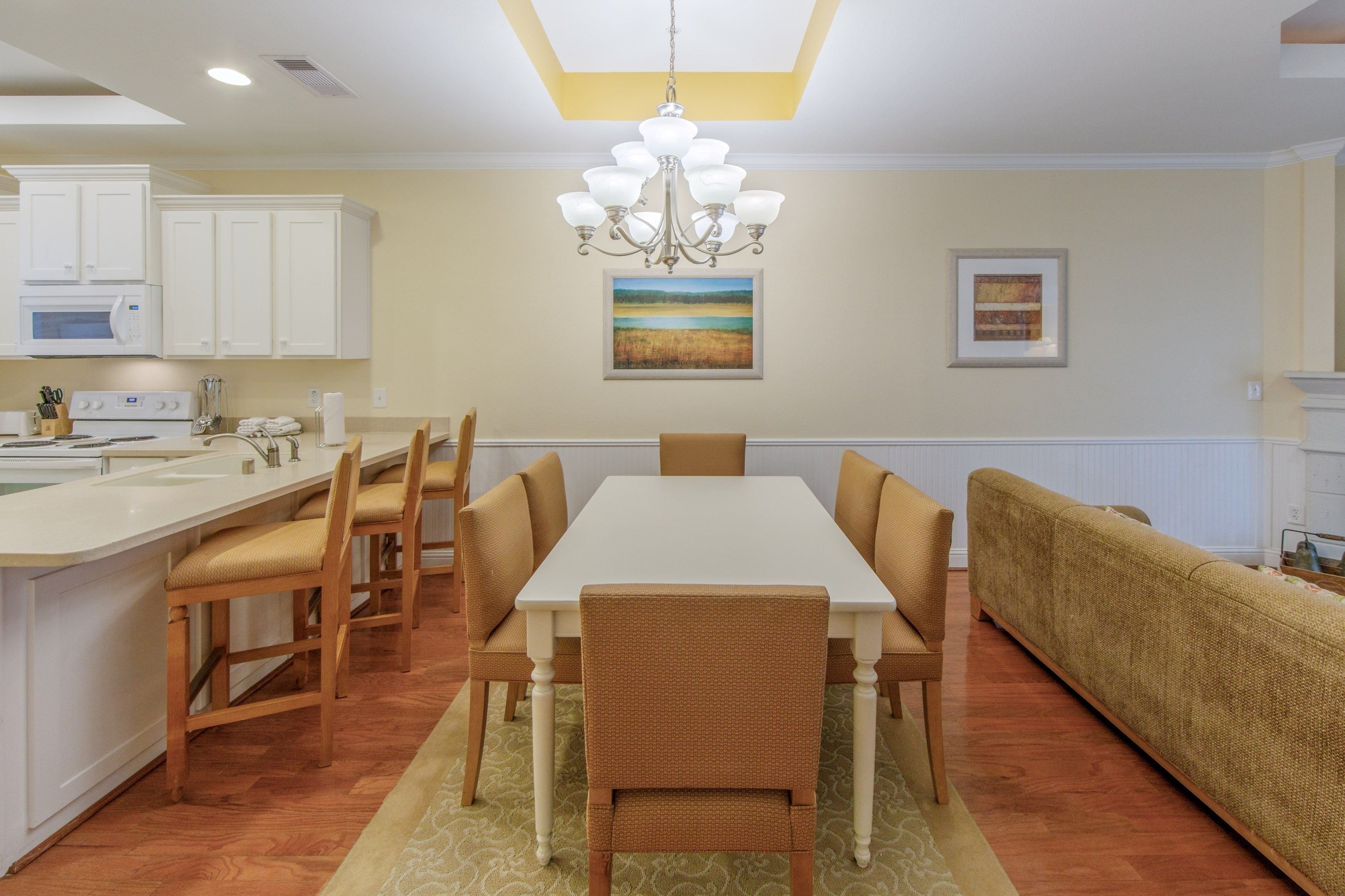 image Loads of room at the dining table and the open-concept is always nice for the cook.