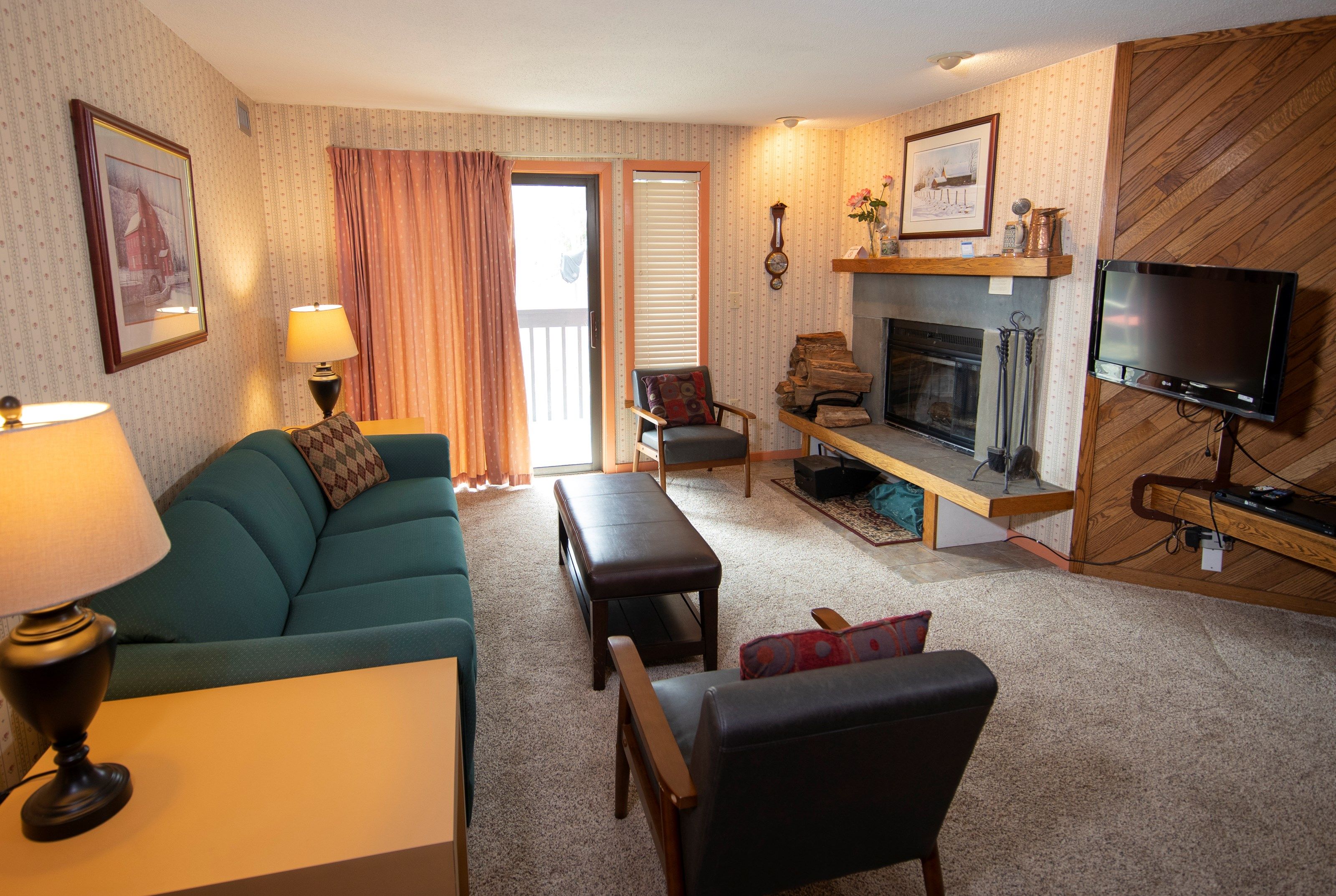 image Stay in our cozy and rustic apartment in Okemo! (Please note that the decor varies)