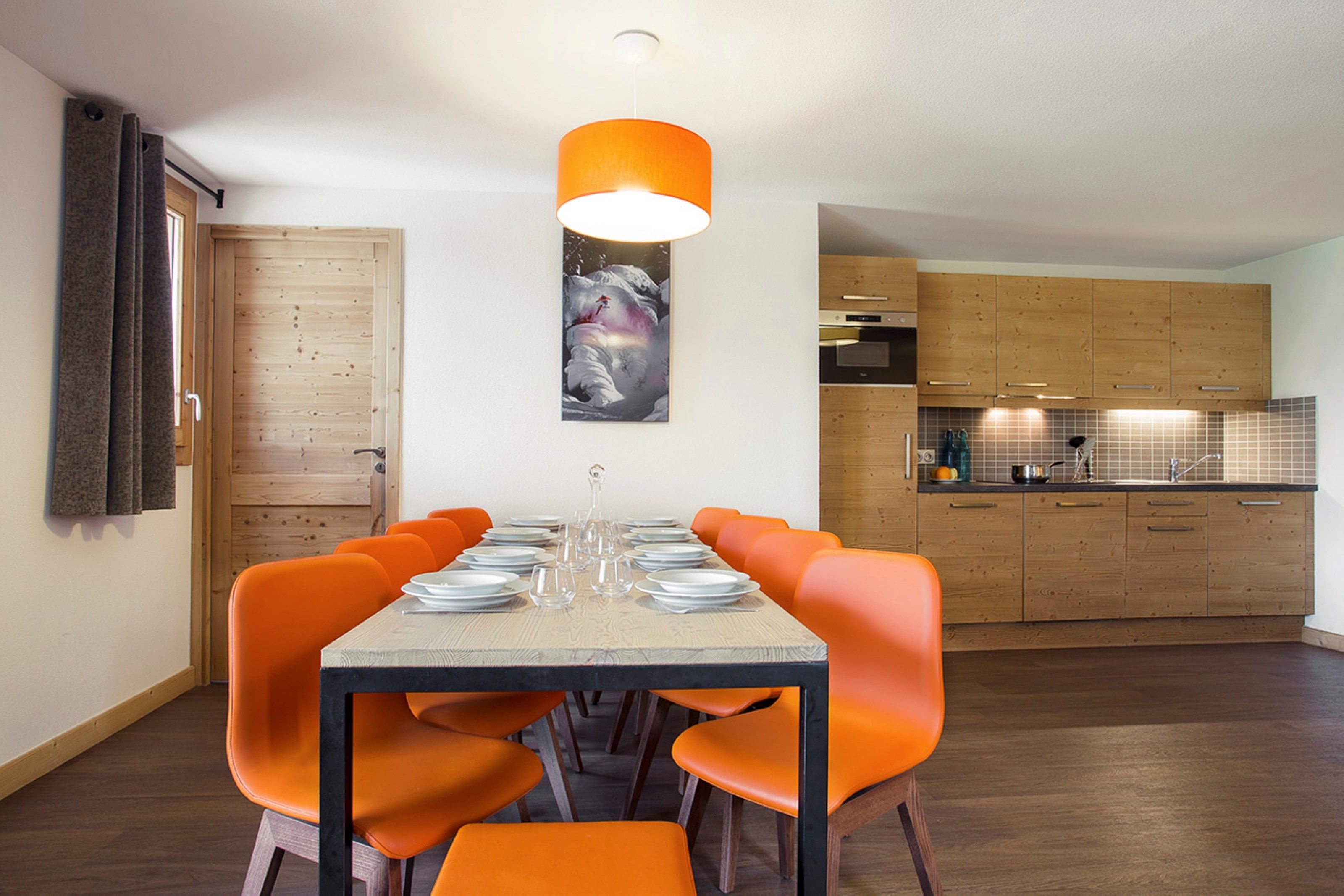 image Loads of room at the dining table and the open-concept is always nice for the cook.