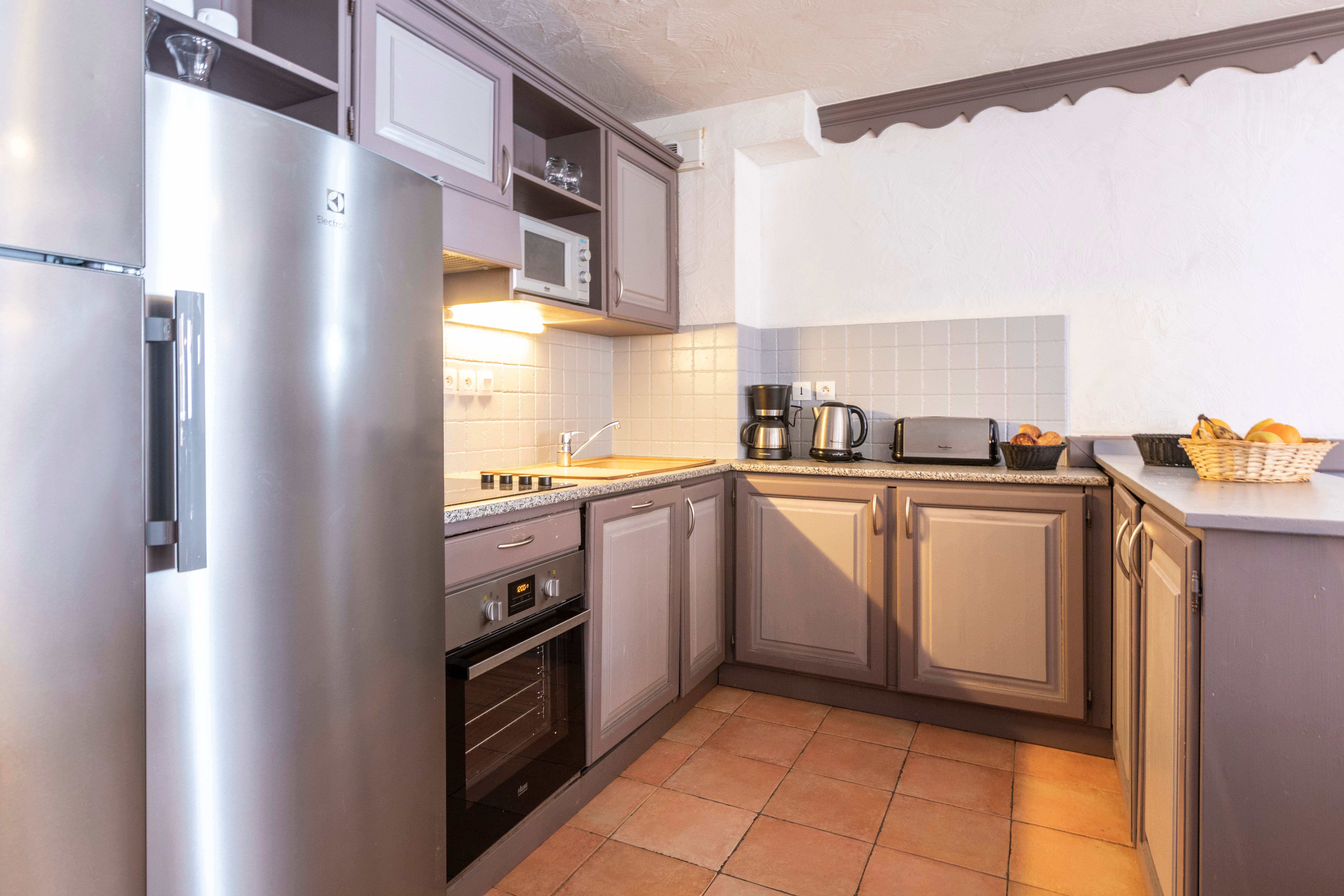 image Everything you need to cook in the fully equipped kitchen.