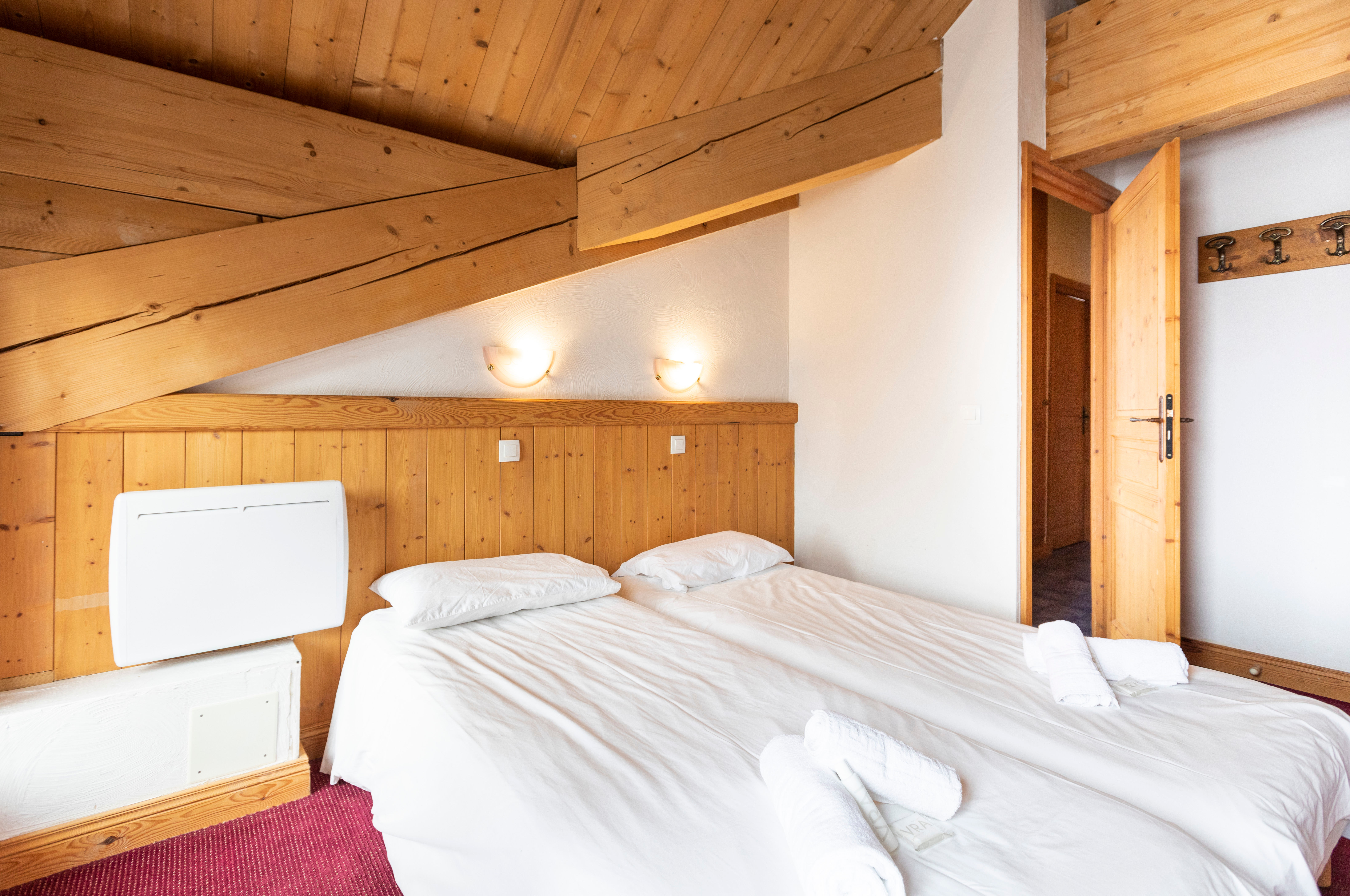 image Single beds for a restful night after skiing.