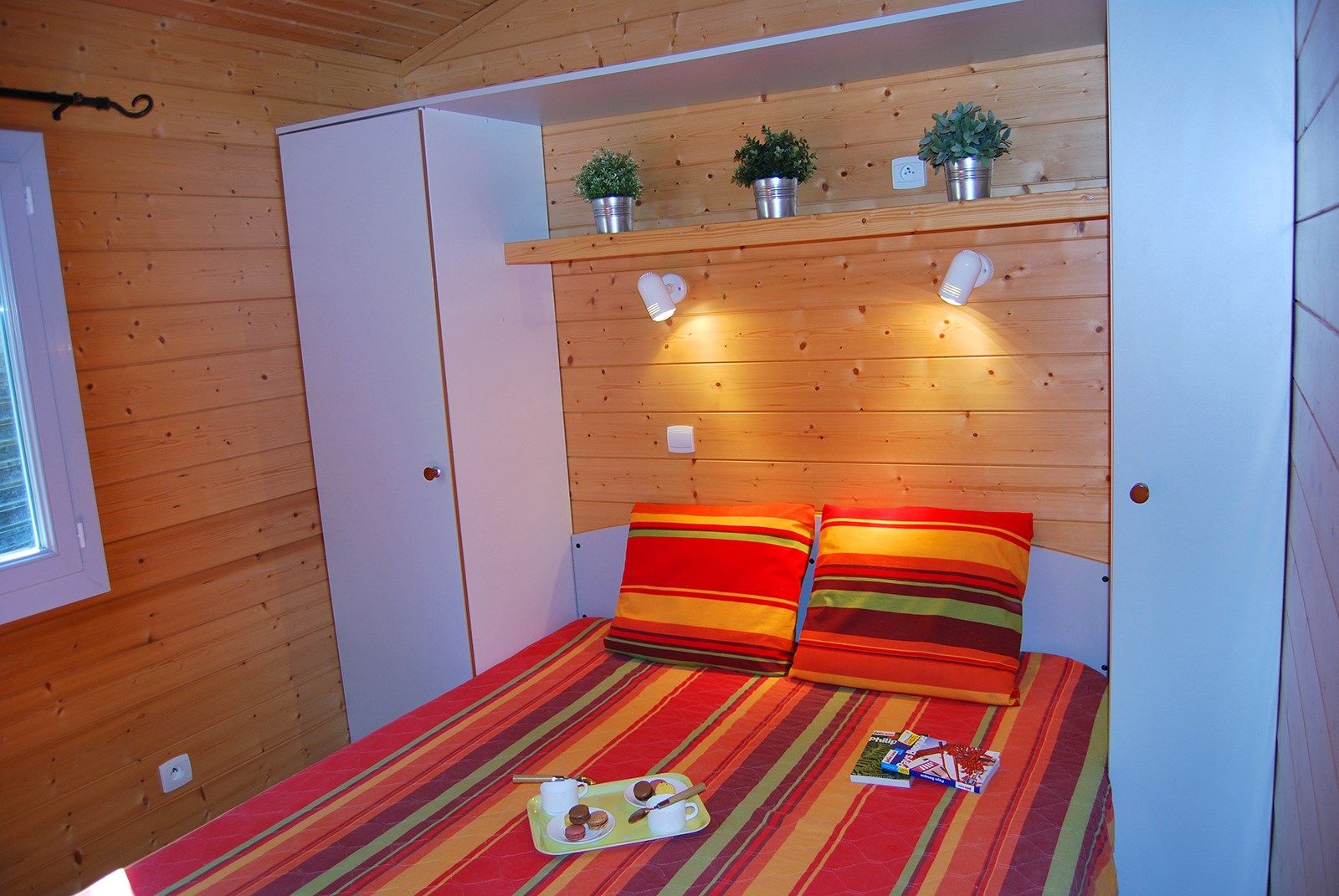 image One bedroom features a Double bed, and the second bedroom contains 2 Single beds.