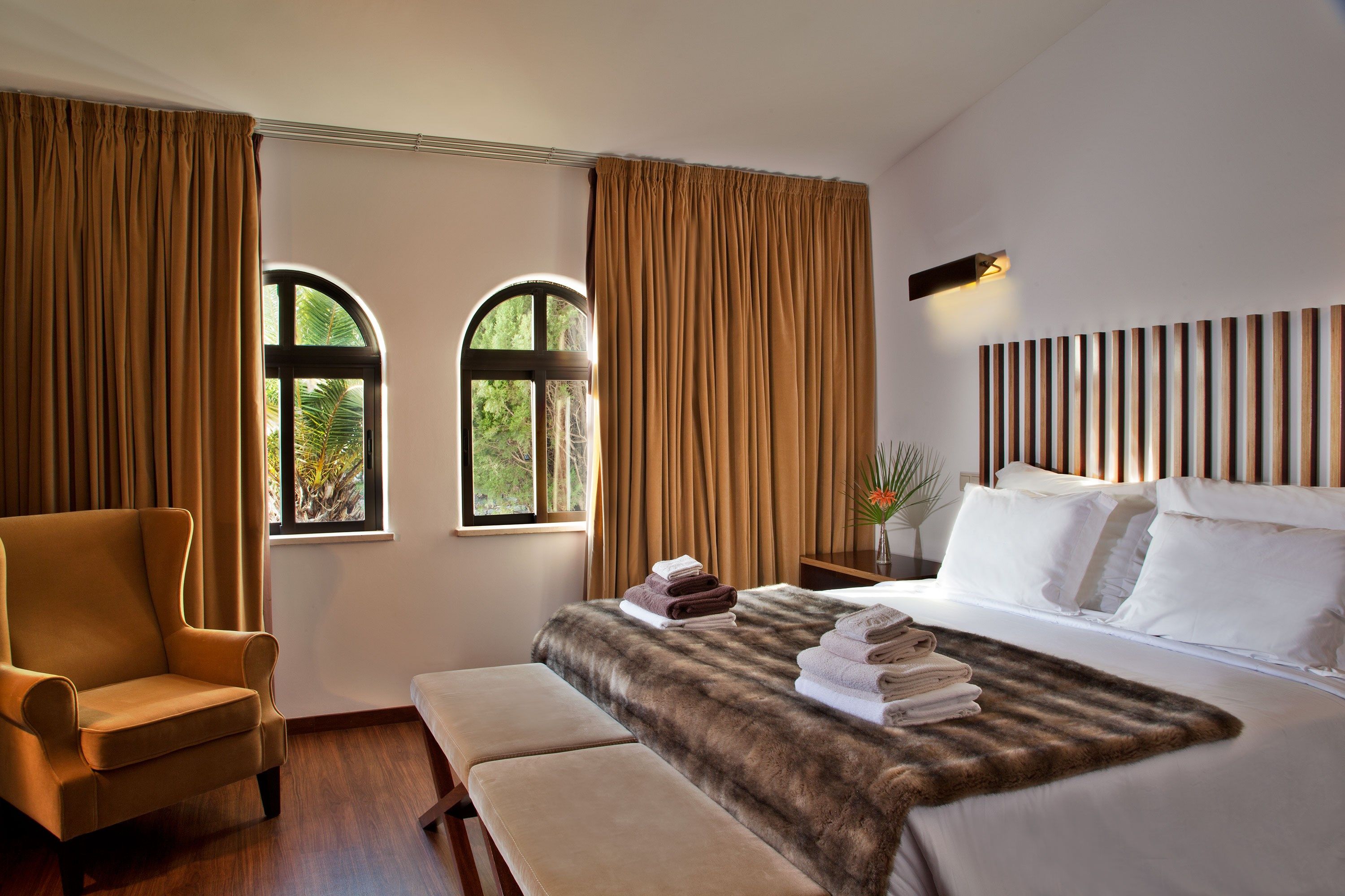 image Drift to sleep in a comfortable bed after a wonderful day outside.