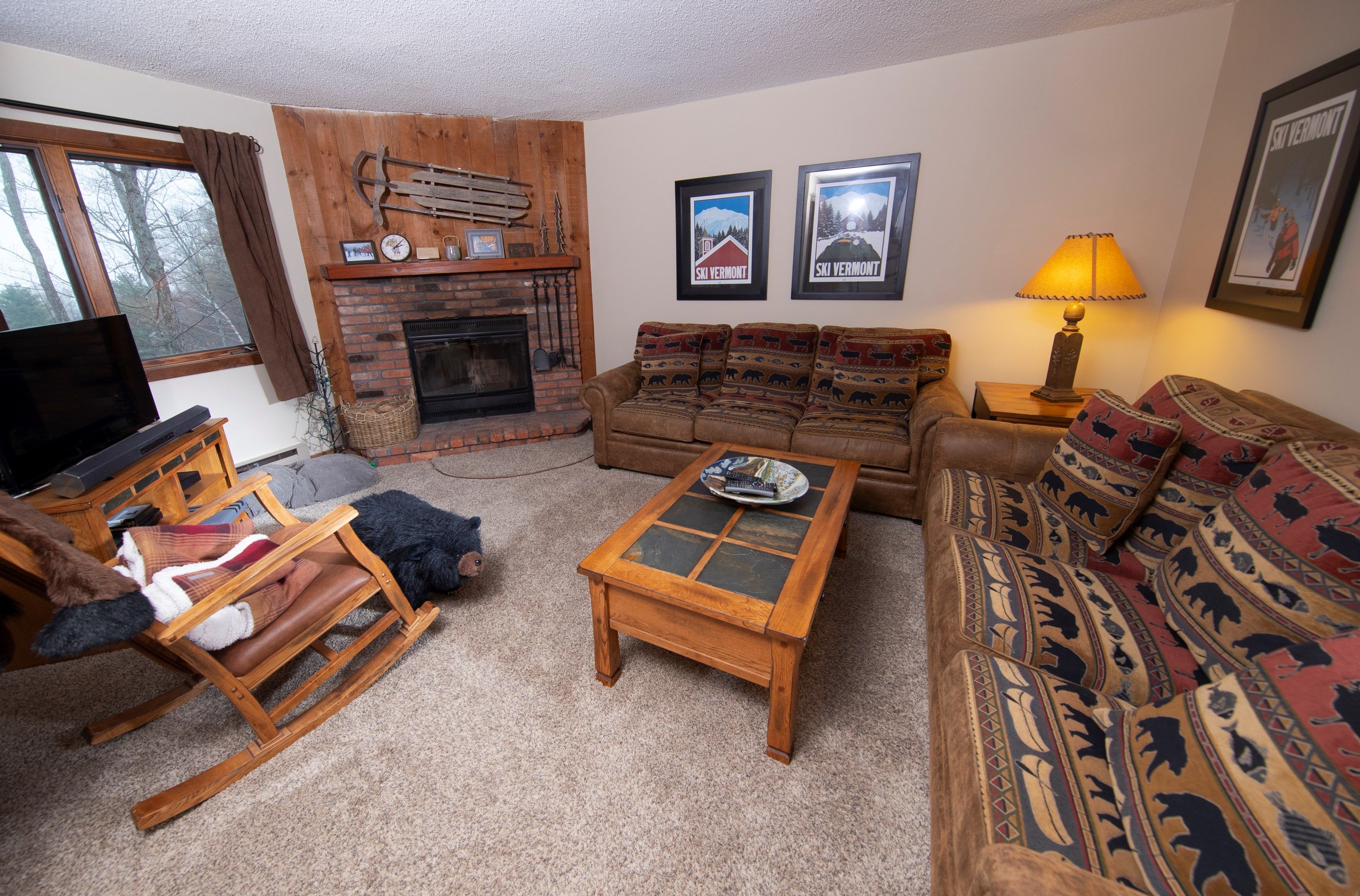 image Sit back and relax in our cozy condo after a great day! (Please note that the decor varies).