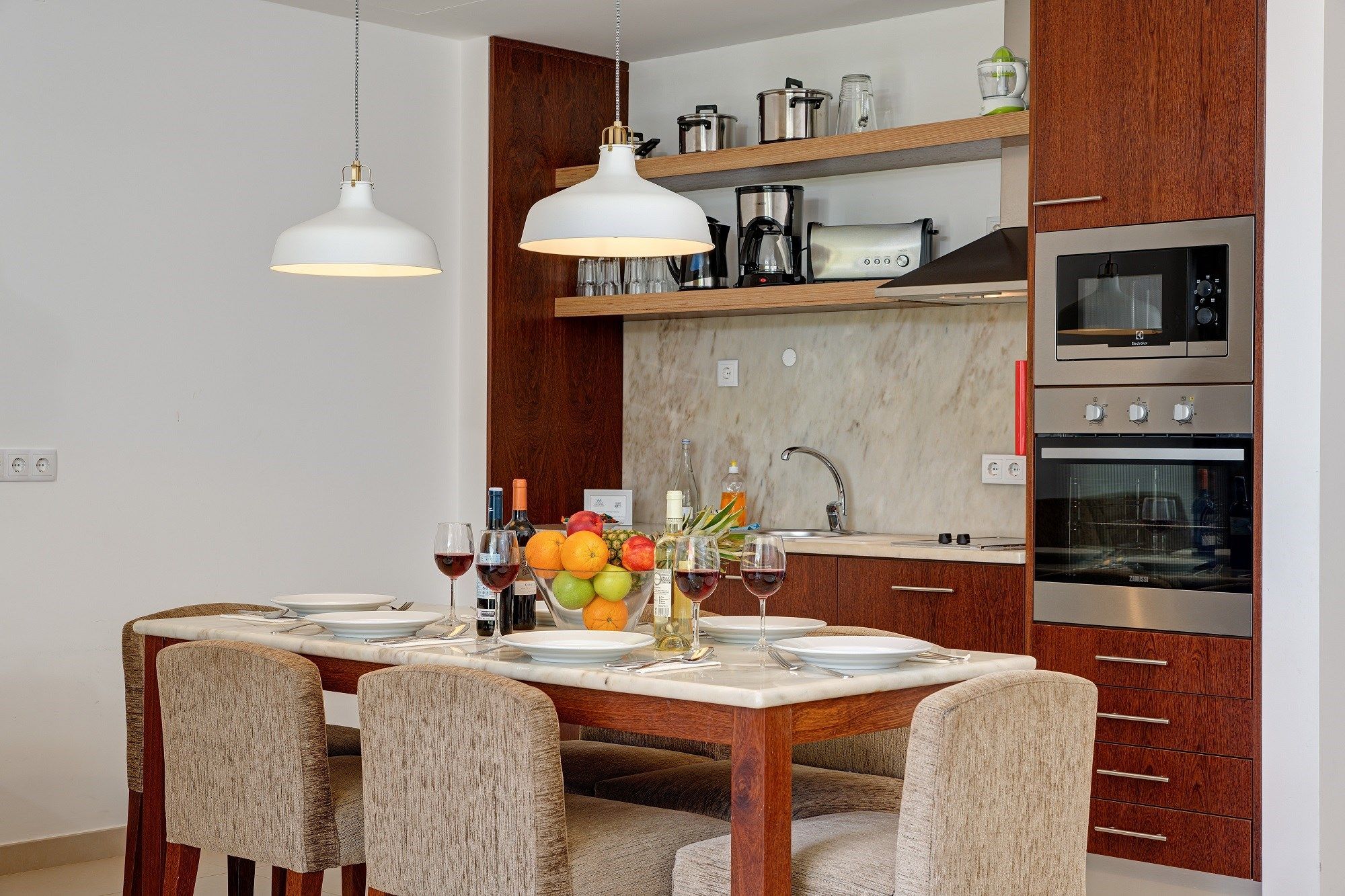image Settle into the dining area and enjoy a nice meal.