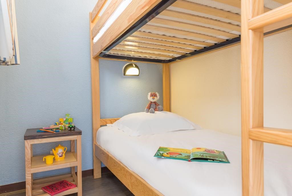 image Drift to sleep in the cozy Bunk bed after a great day.