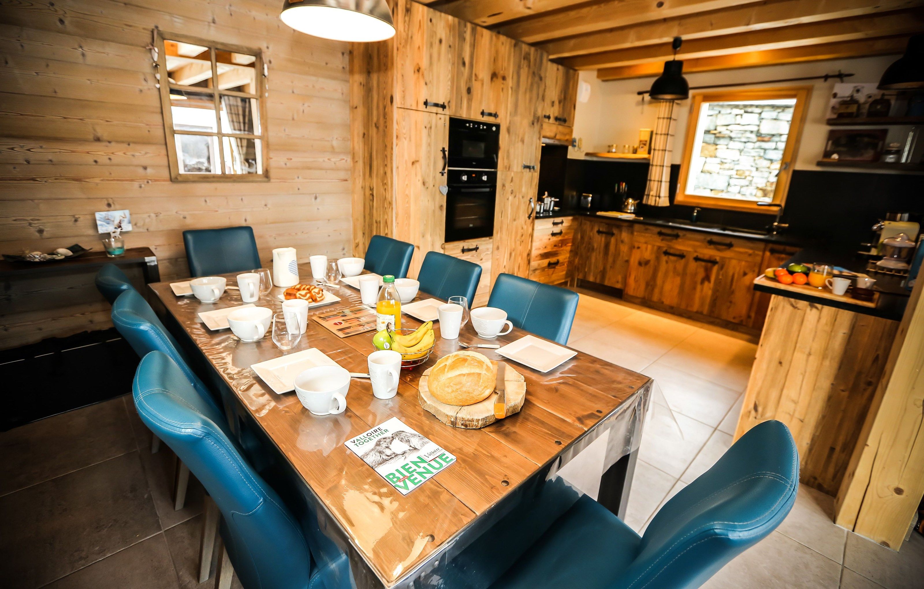 image Loads of room at the dining table and the open-concept is always nice for the cook.