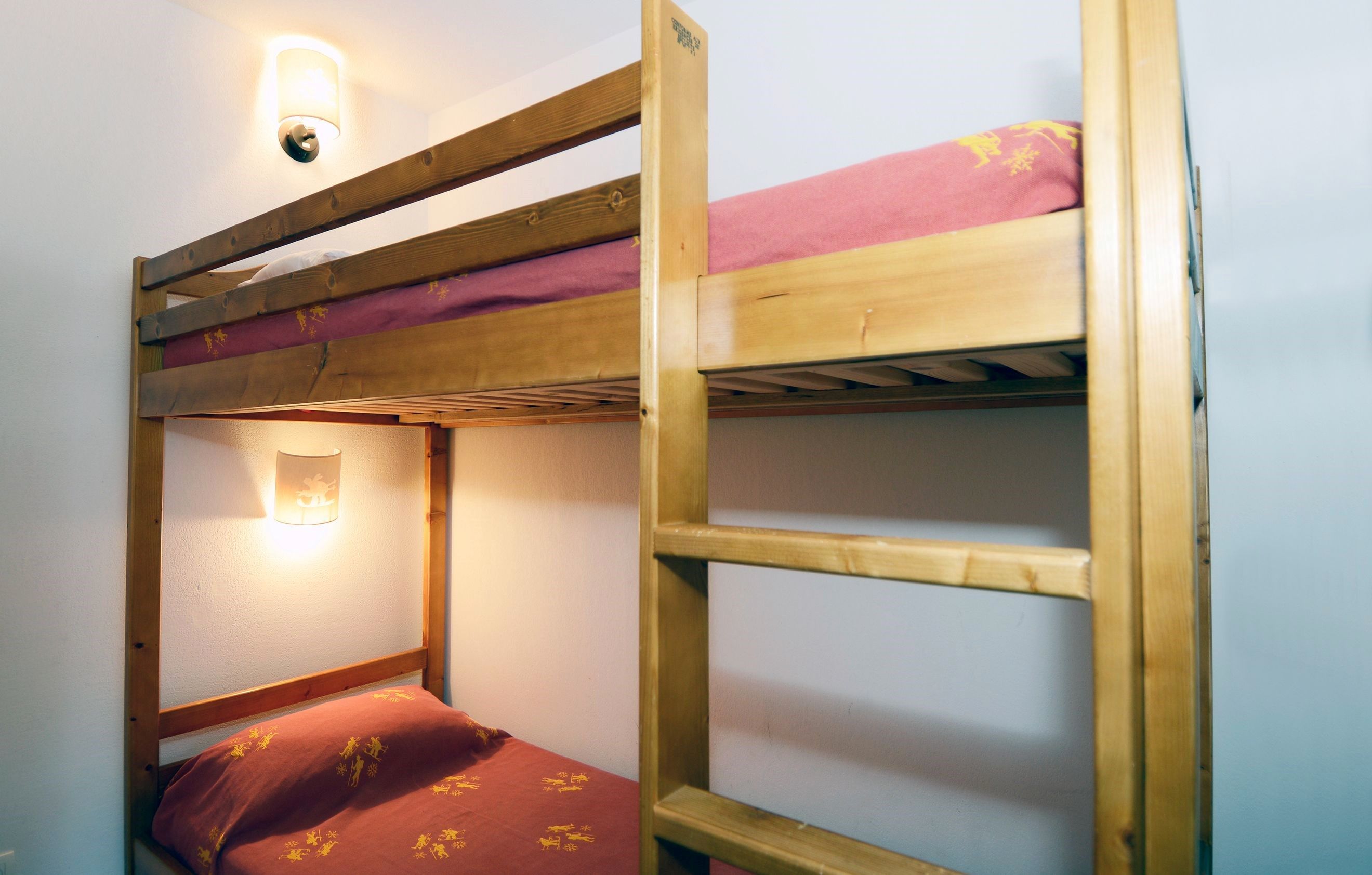 image Tuck the kids into the bunk beds in the sleeping alcove.