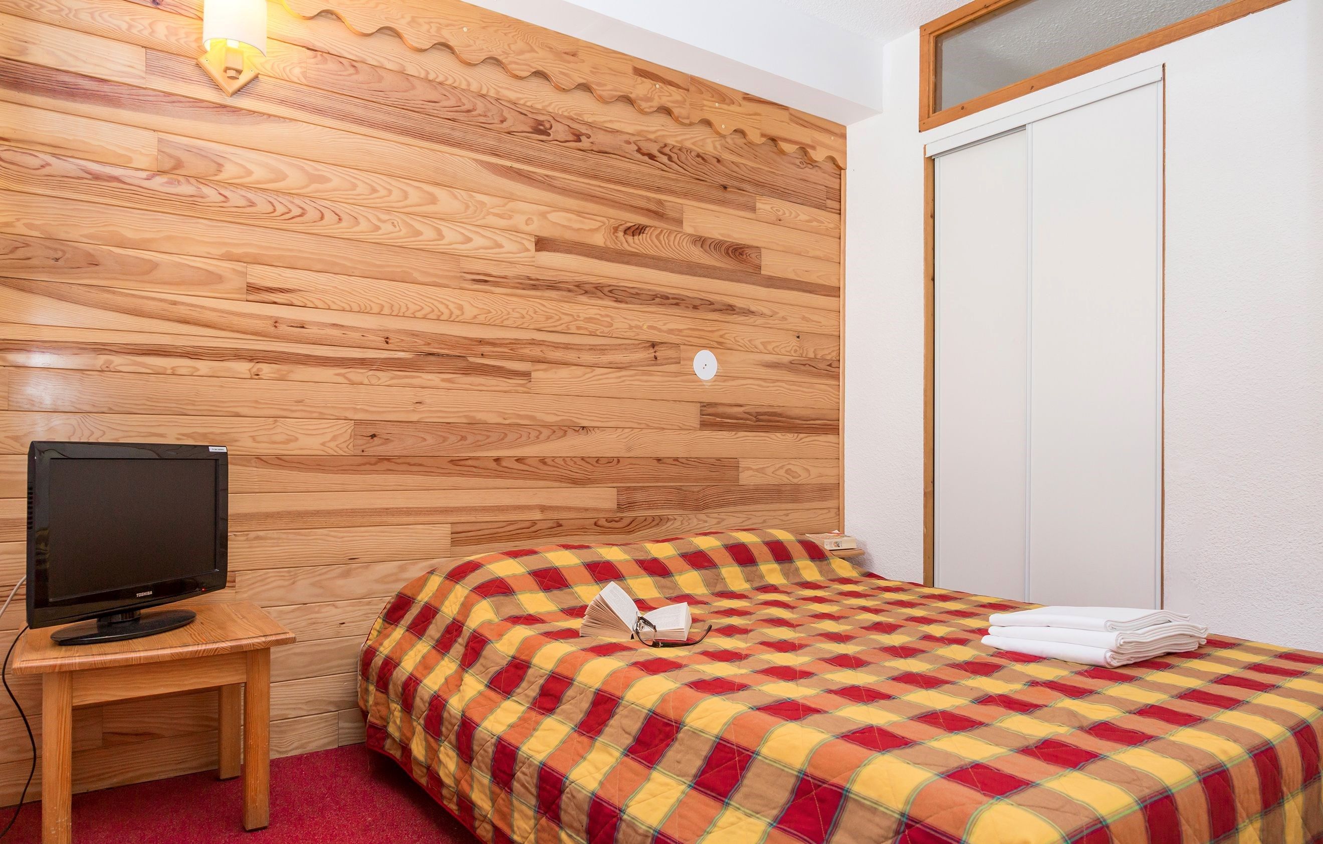 image The master bedroom features a cozy Double bed.
