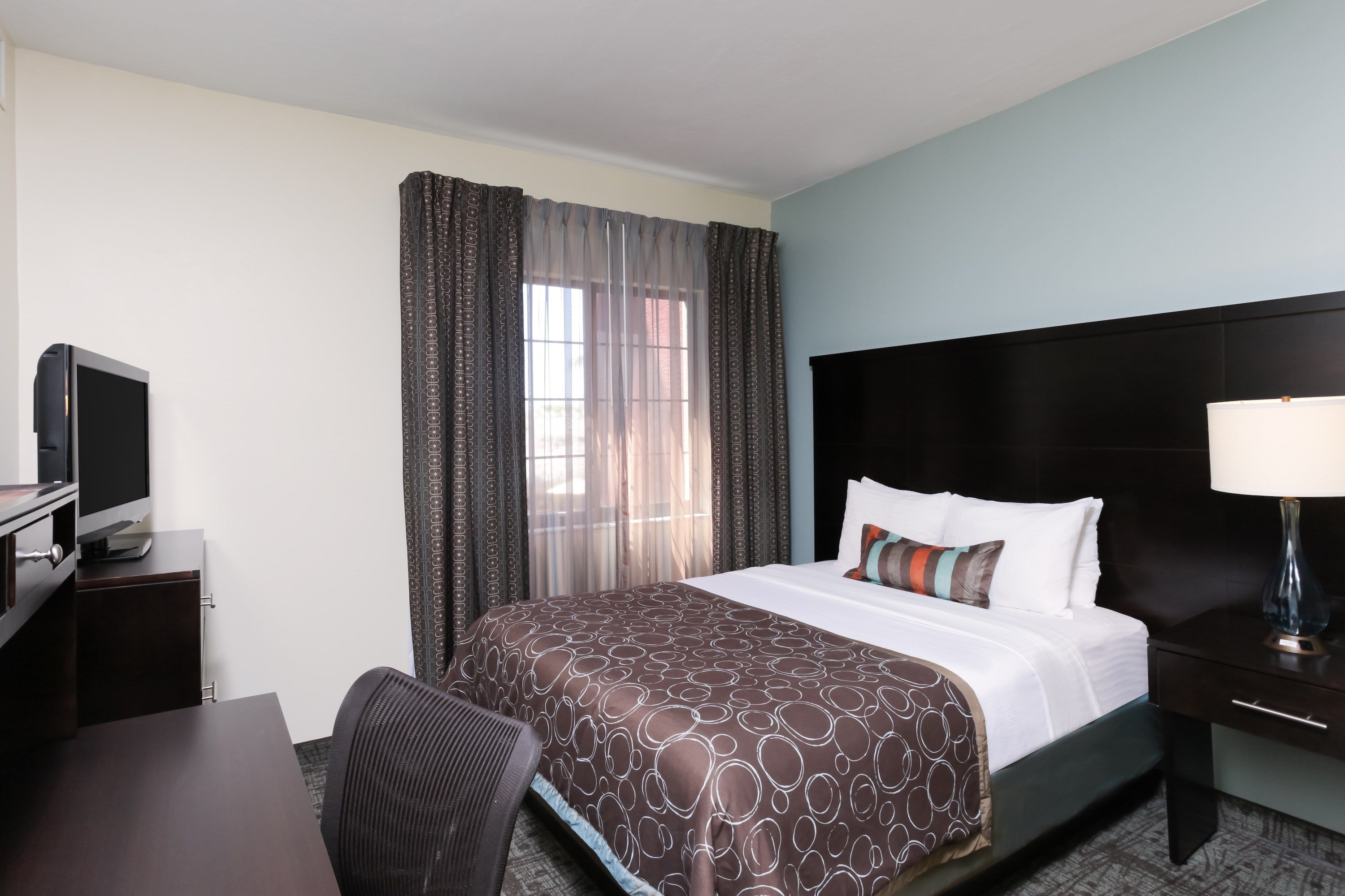 image Drift to sleep in a comfortable bed after a wonderful day outside.