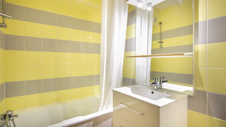 image Freshen up in the bathroom after a day of adventure.