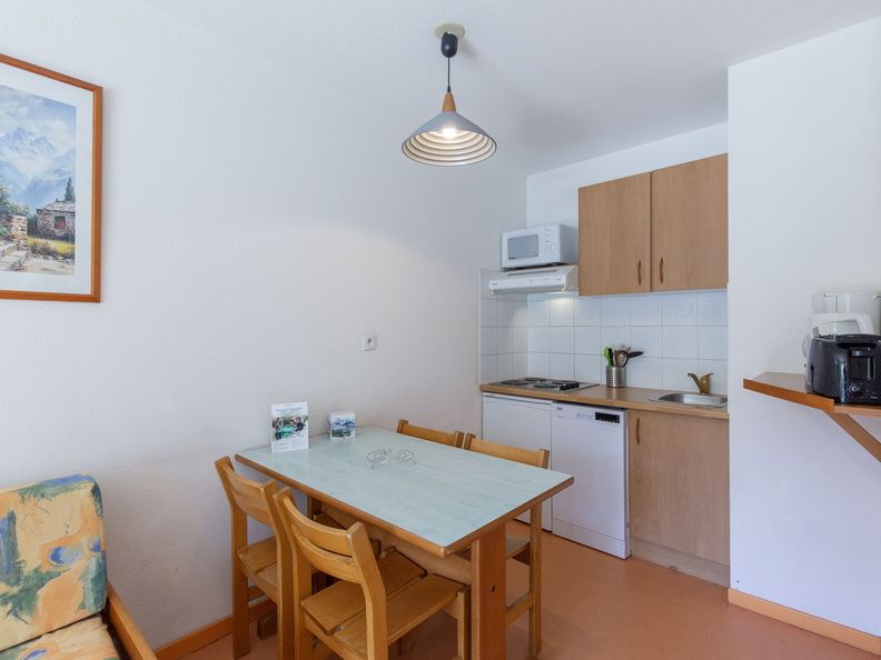 image A well-equipped kitchenette awaits, perfect for preparing meals and enjoying quality time with loved ones.