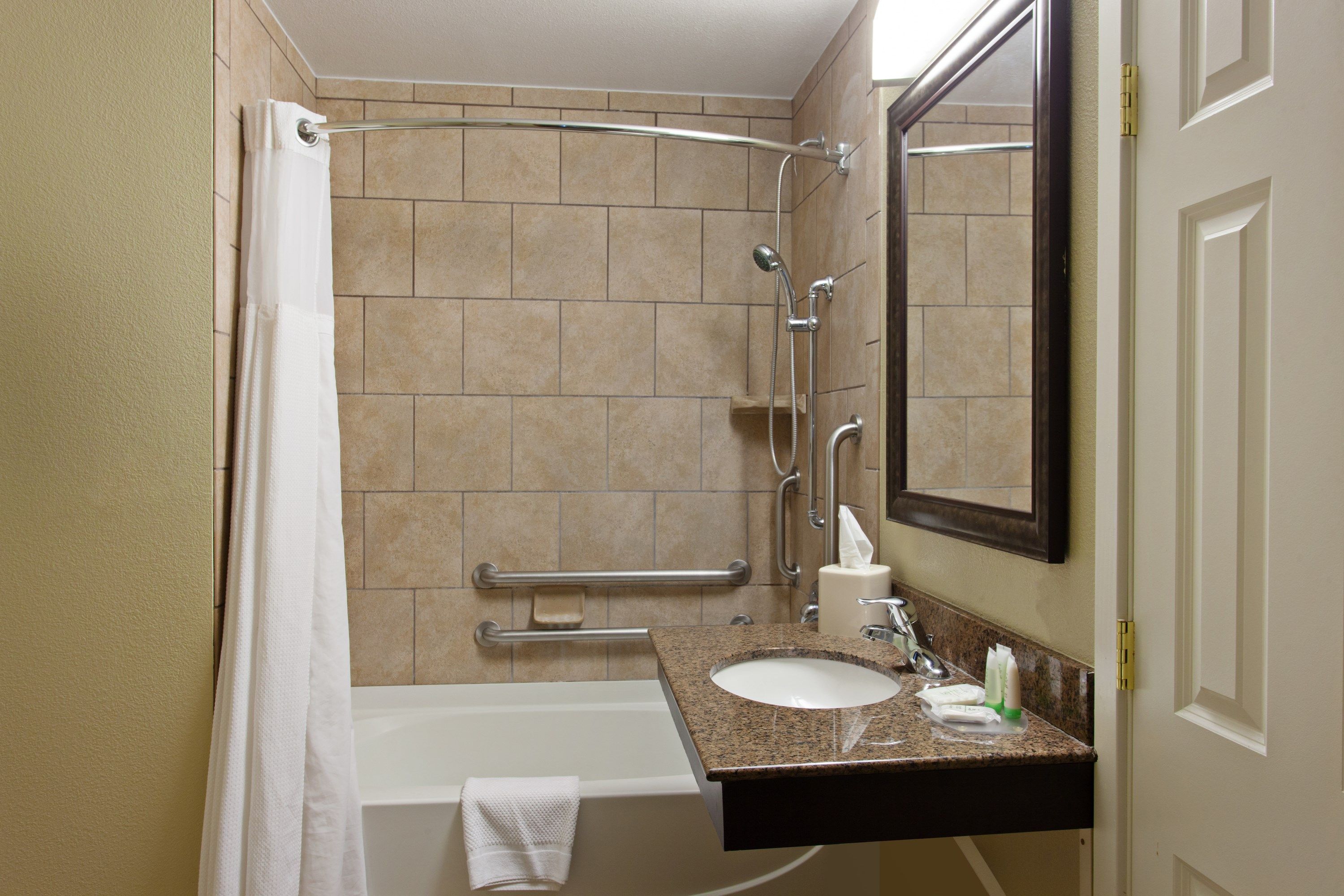 image This bathroom features an accessible tub.