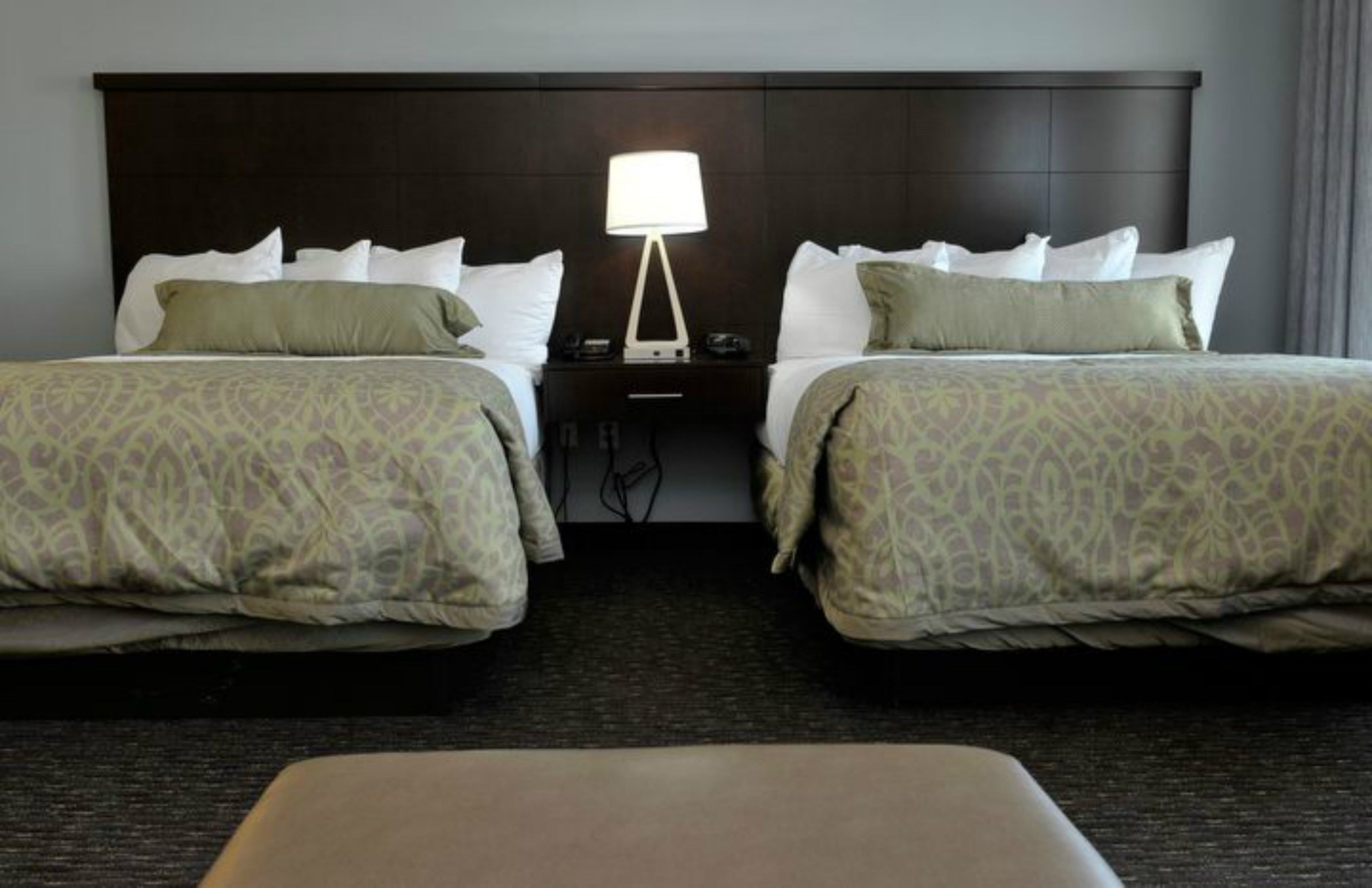 image Drift to sleep in a comfortable bed after a wonderful day outside.